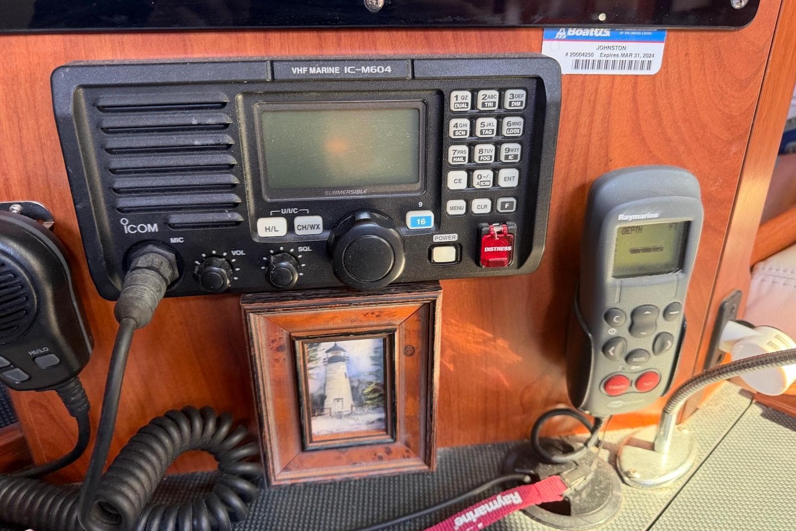 VHF marine radio and depth gauge on 2009 Hunter 50 Center Cockpit yacht.