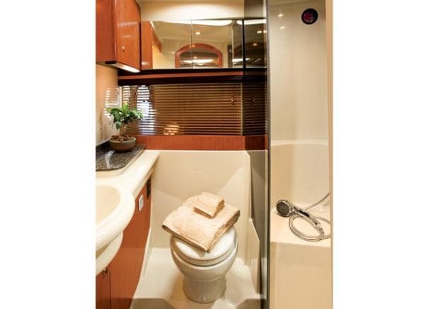 Luxurious bathroom in a 2008 Cruisers Yachts 390 Sports Coupe.