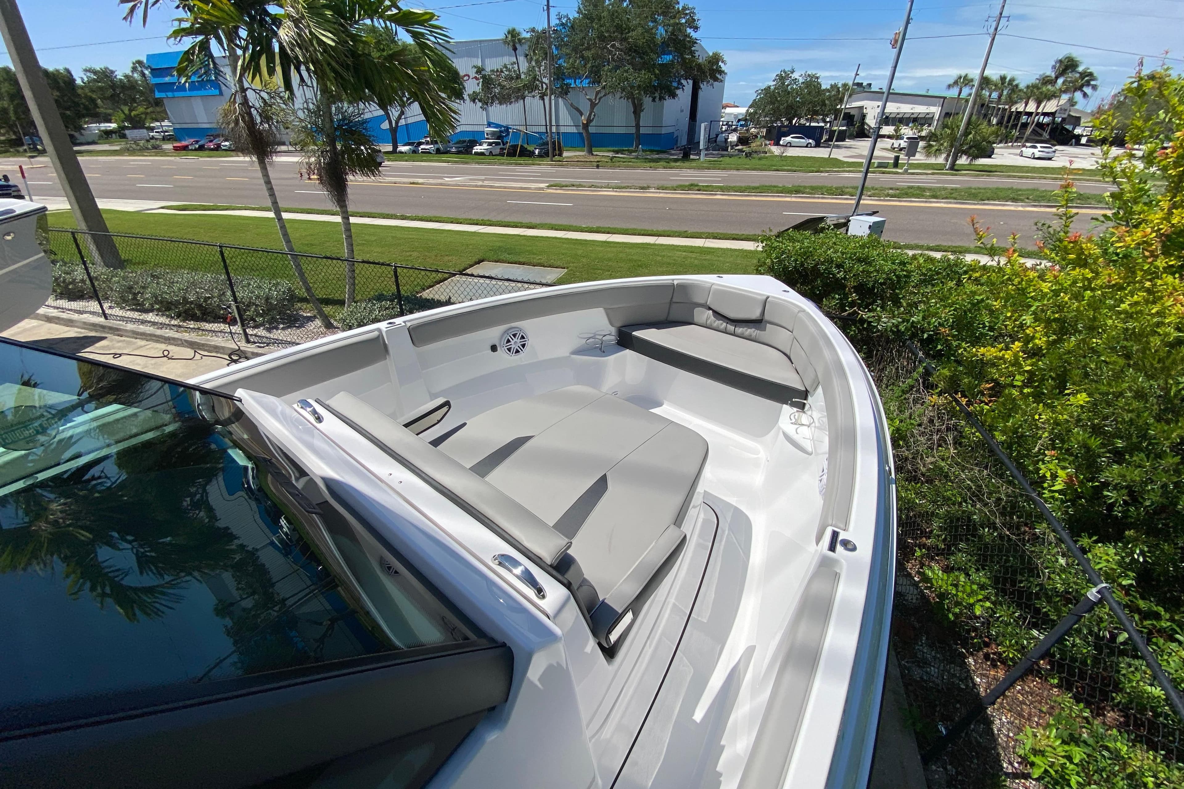 2026 Monterey Elite 25 OB boat with spacious seating and sleek design.