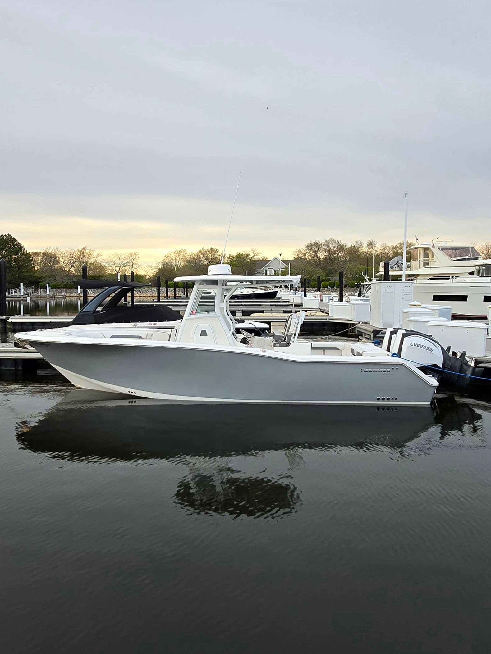 2018 Tidewater 280 CC Adventure boat docked at marina.