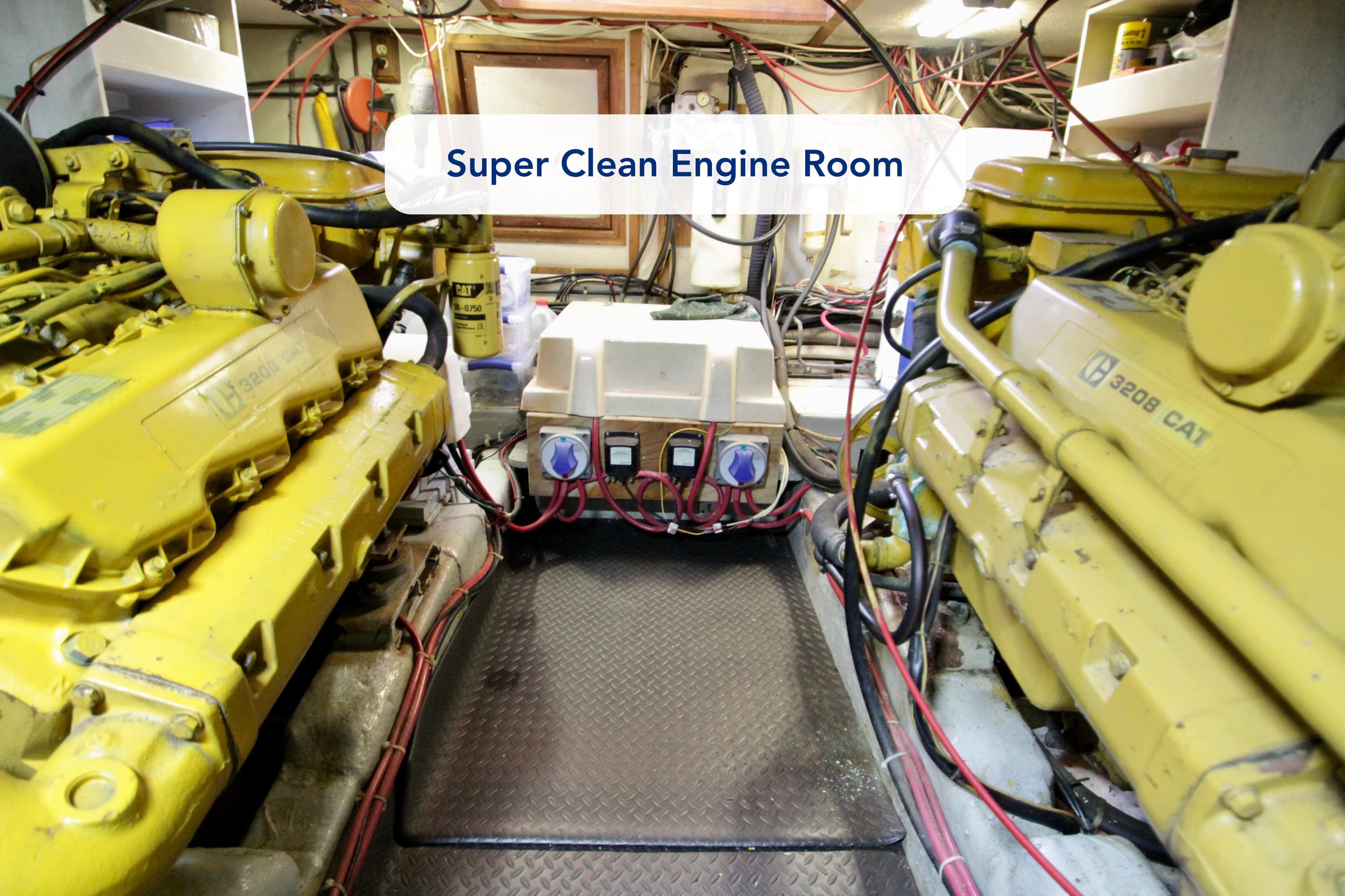Super clean engine room with dual yellow engines, Symbol 51, 1984 model.