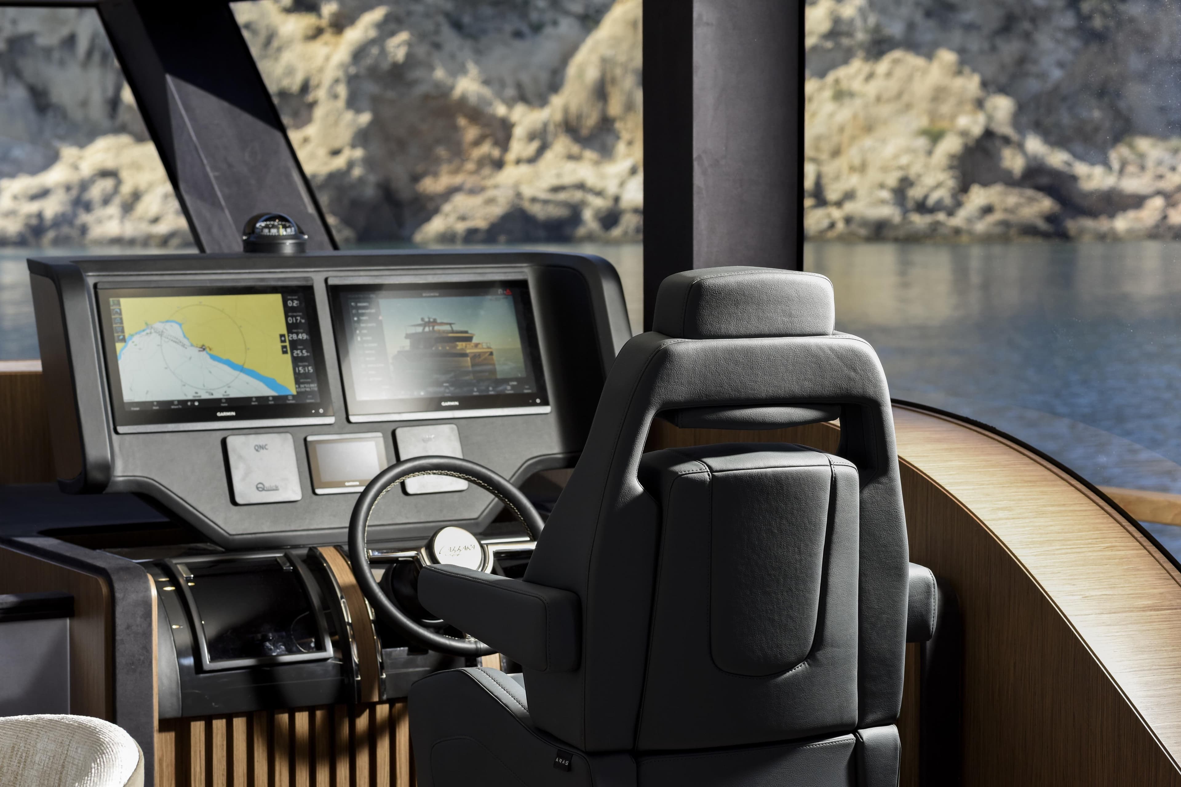 Modern helm of 2027 Lazzara LPC 300 yacht with dual navigation screens.
