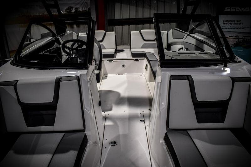 2023 Yamaha Boats AR220 interior with sleek seating and modern dashboard.