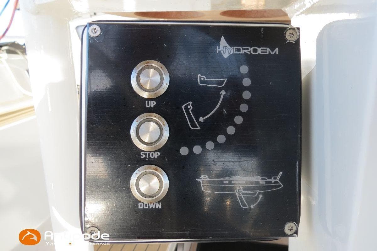 Control panel with buttons labeled "Up," "Stop," "Down" on a 2021 Meta JPB 52.