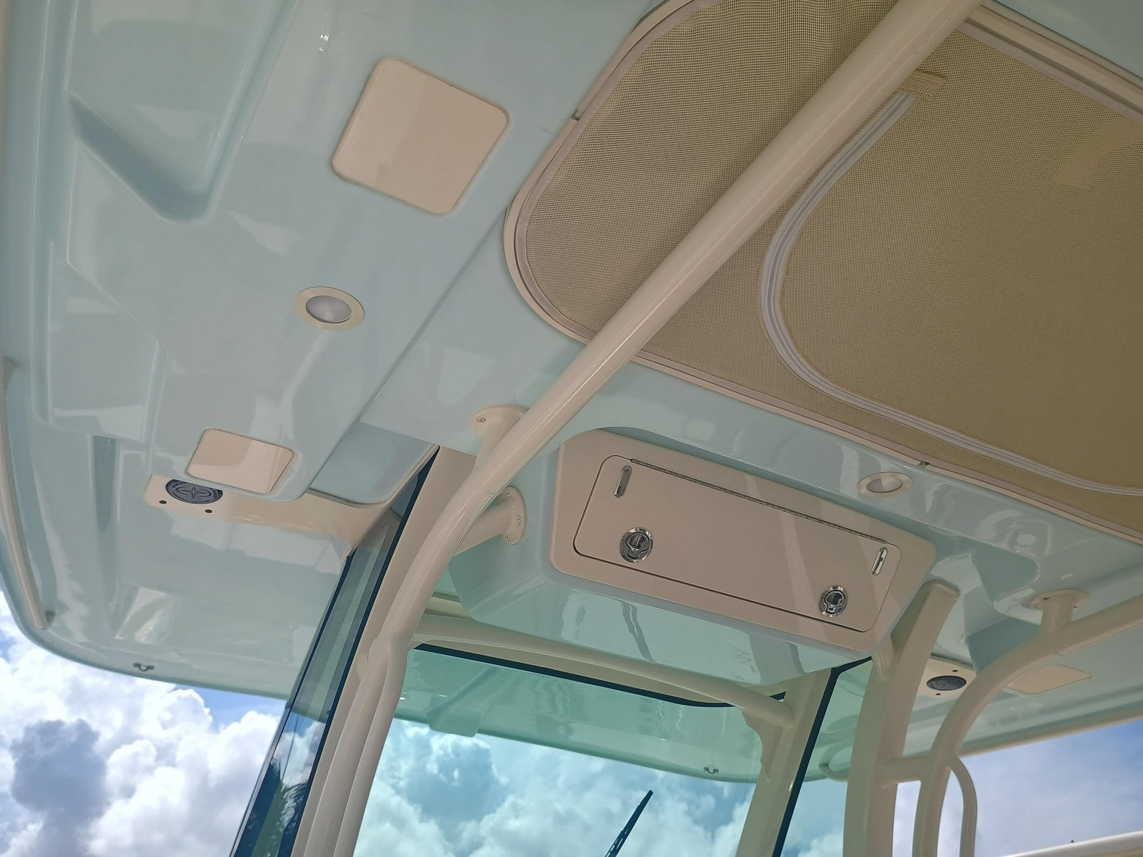 2025 Grady-White Canyon 306 boat interior ceiling with storage compartments.