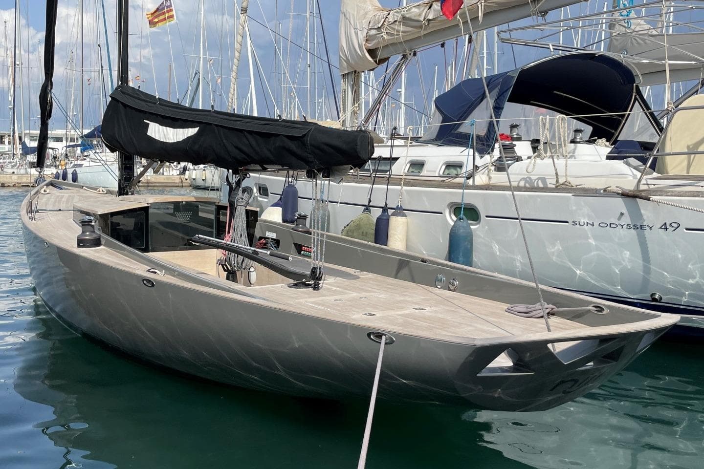 2009 Wally Wallynano 37 sailboat docked in marina, sleek design, modern aesthetics.