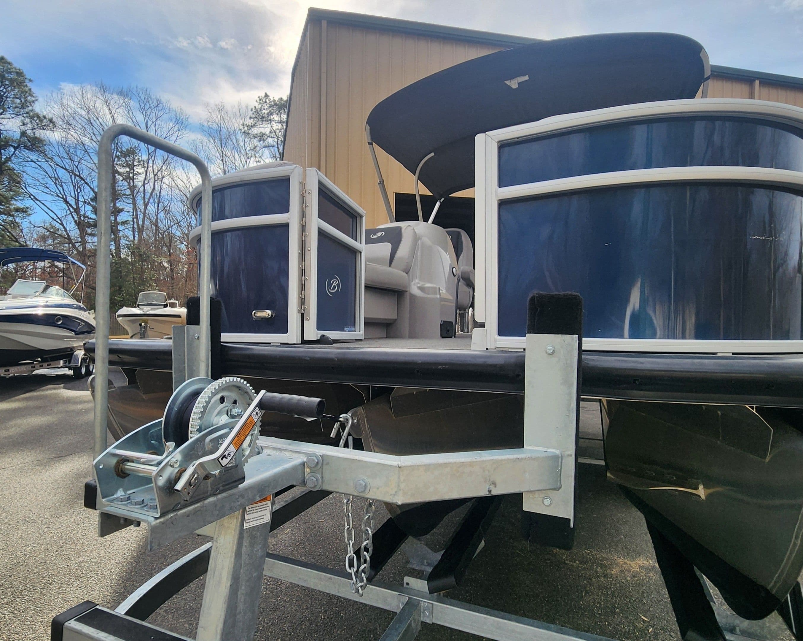 2025 Barletta ARIA 22UC pontoon boat on trailer.