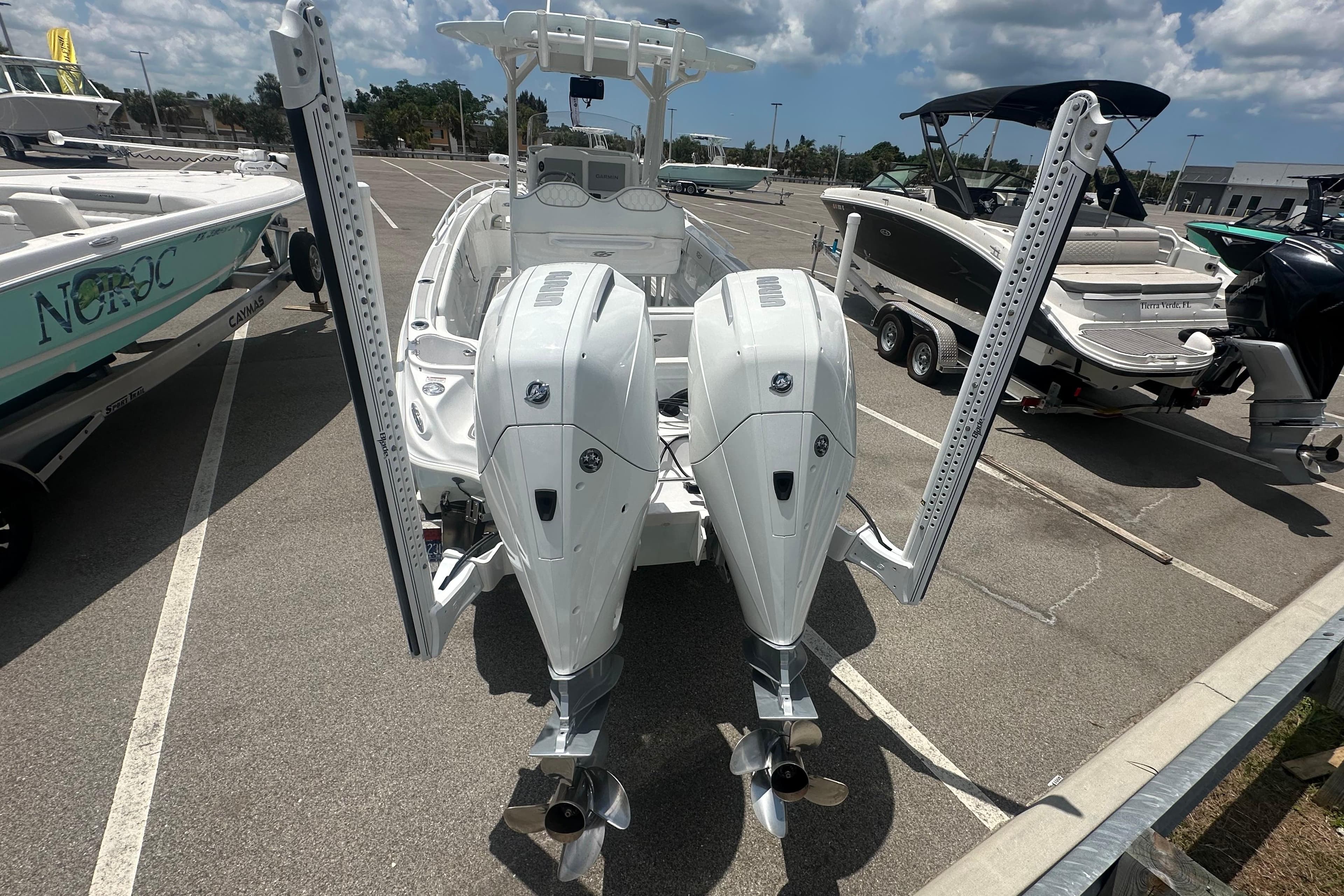2022 Glasstream 280 Pro-XS boat with dual outboard motors in a marina.