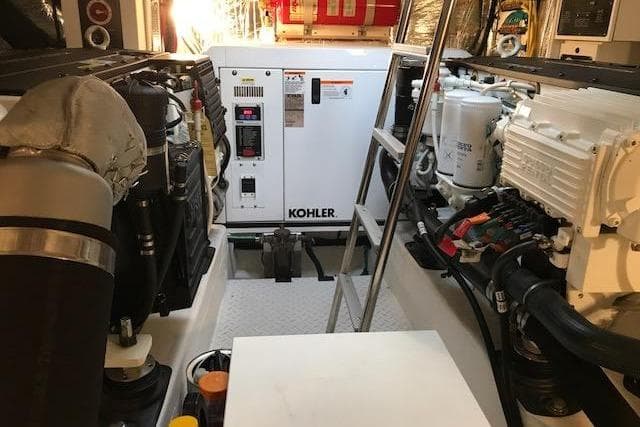 Engine room of 2014 Cruisers Yachts 41 Cantius with Kohler generator.