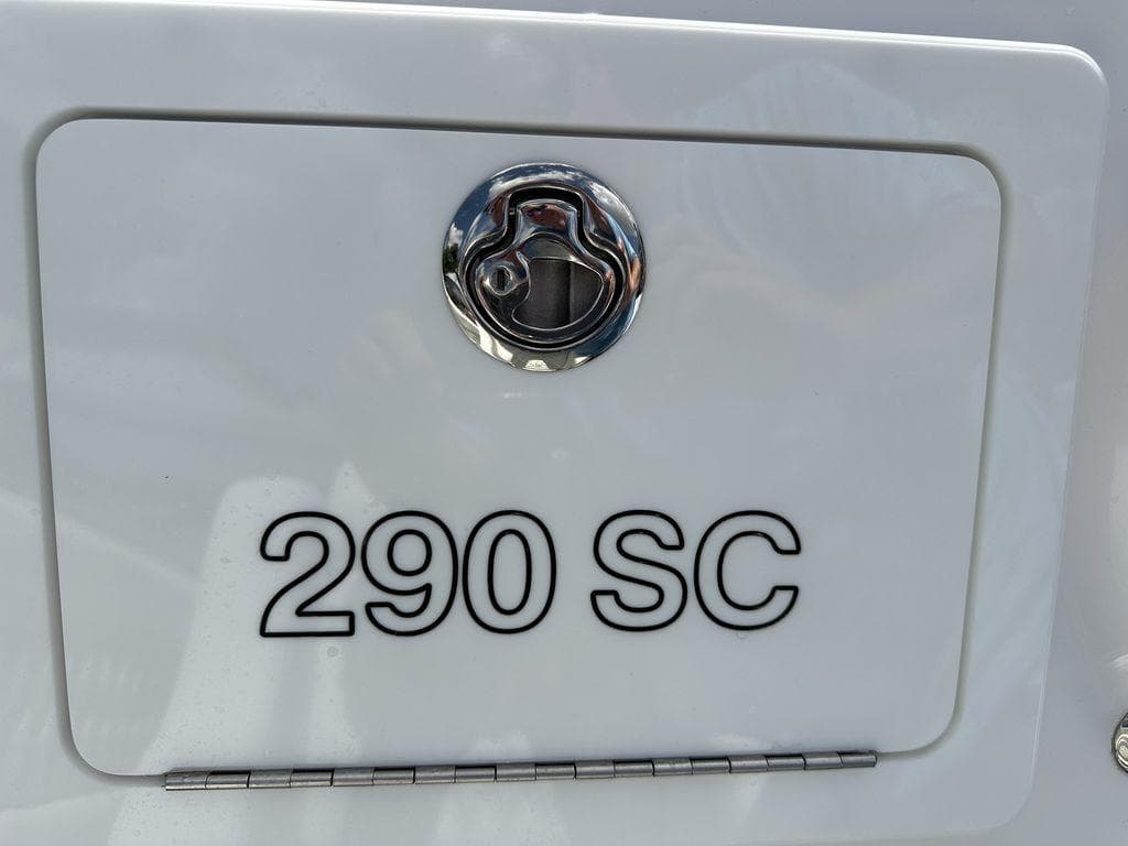 2024 Velocity 290SC boat compartment with chrome latch.