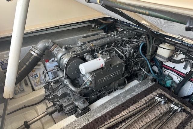 Engine compartment of a 2002 Island Packet Packet Craft 36, showcasing detailed mechanical components.