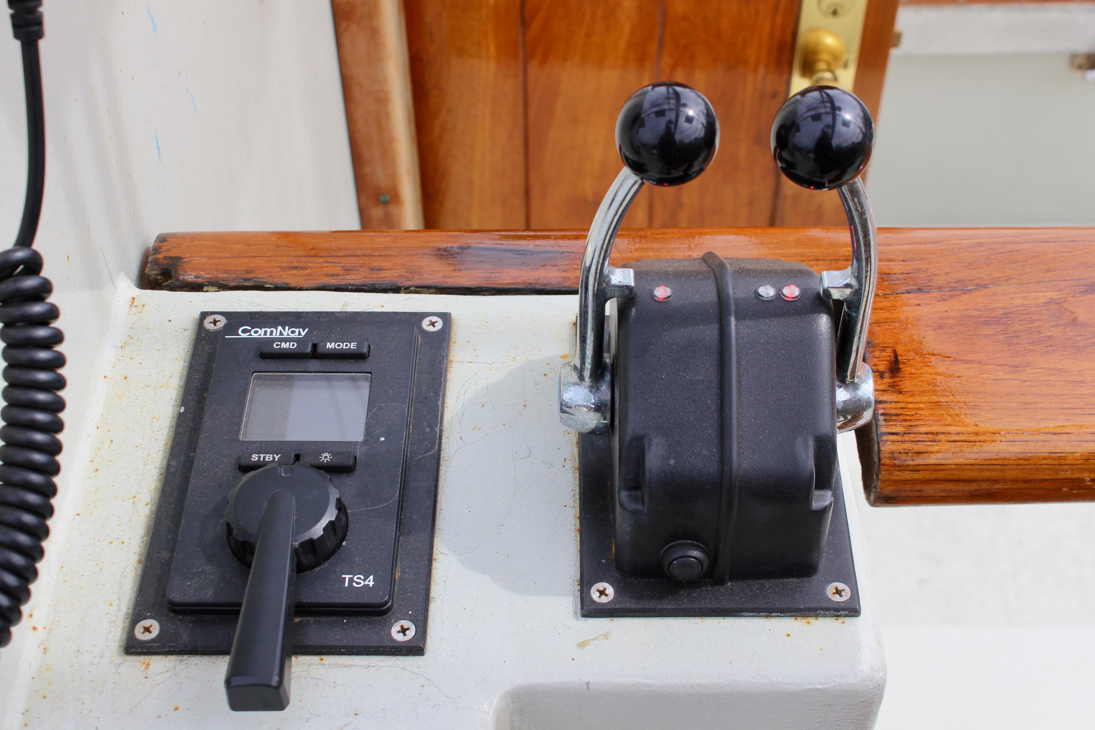 Control panel of 1988 Custom Lahaina Welding Co. Square Topsail Ketch with dual throttle levers.