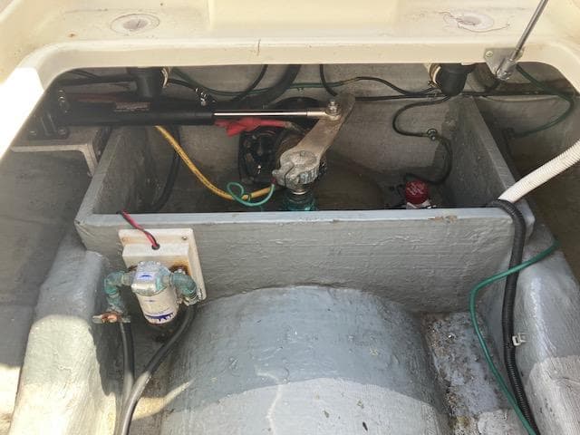 2005 Back Cove Downeast Hardtop engine compartment with visible wiring and components.