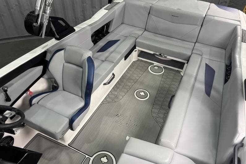 2023 MasterCraft NXT24 boat interior with gray seating and modern design.