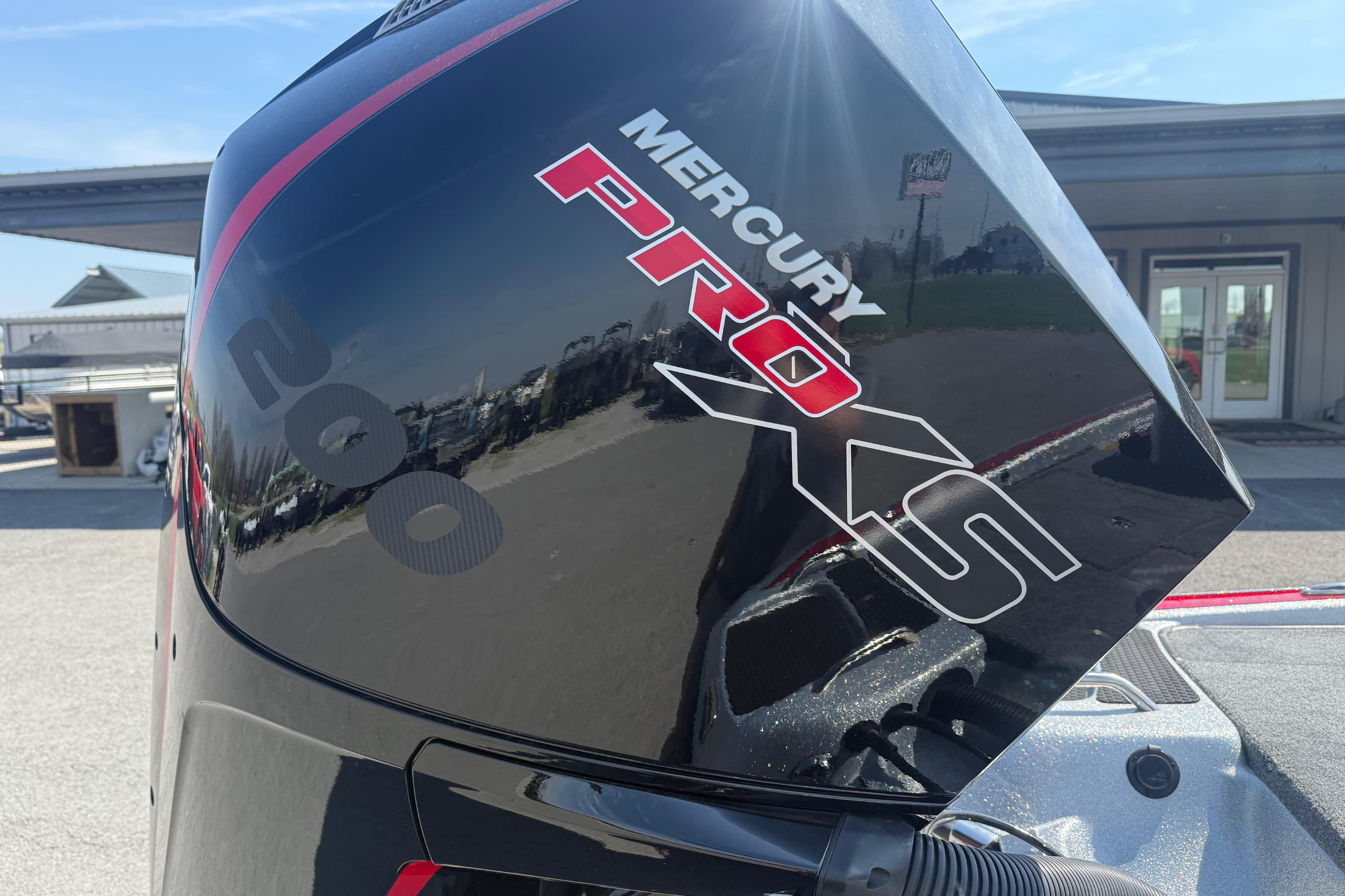 Mercury Pro XS engine on a 2026 Phoenix 819 ZXL boat, outdoor setting.
