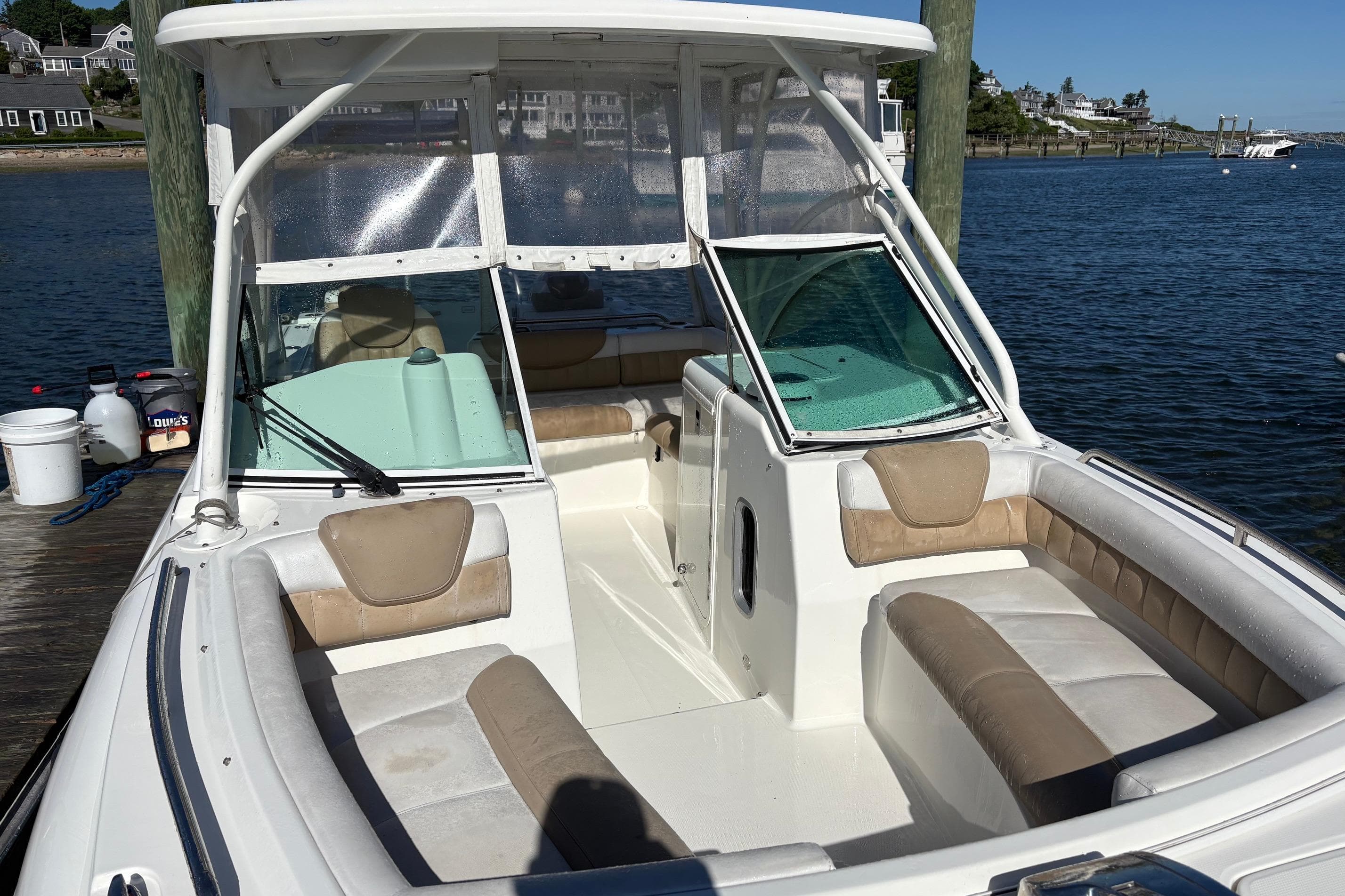 2016 Glacier Bay 2740 Dual Console boat docked by the water.
