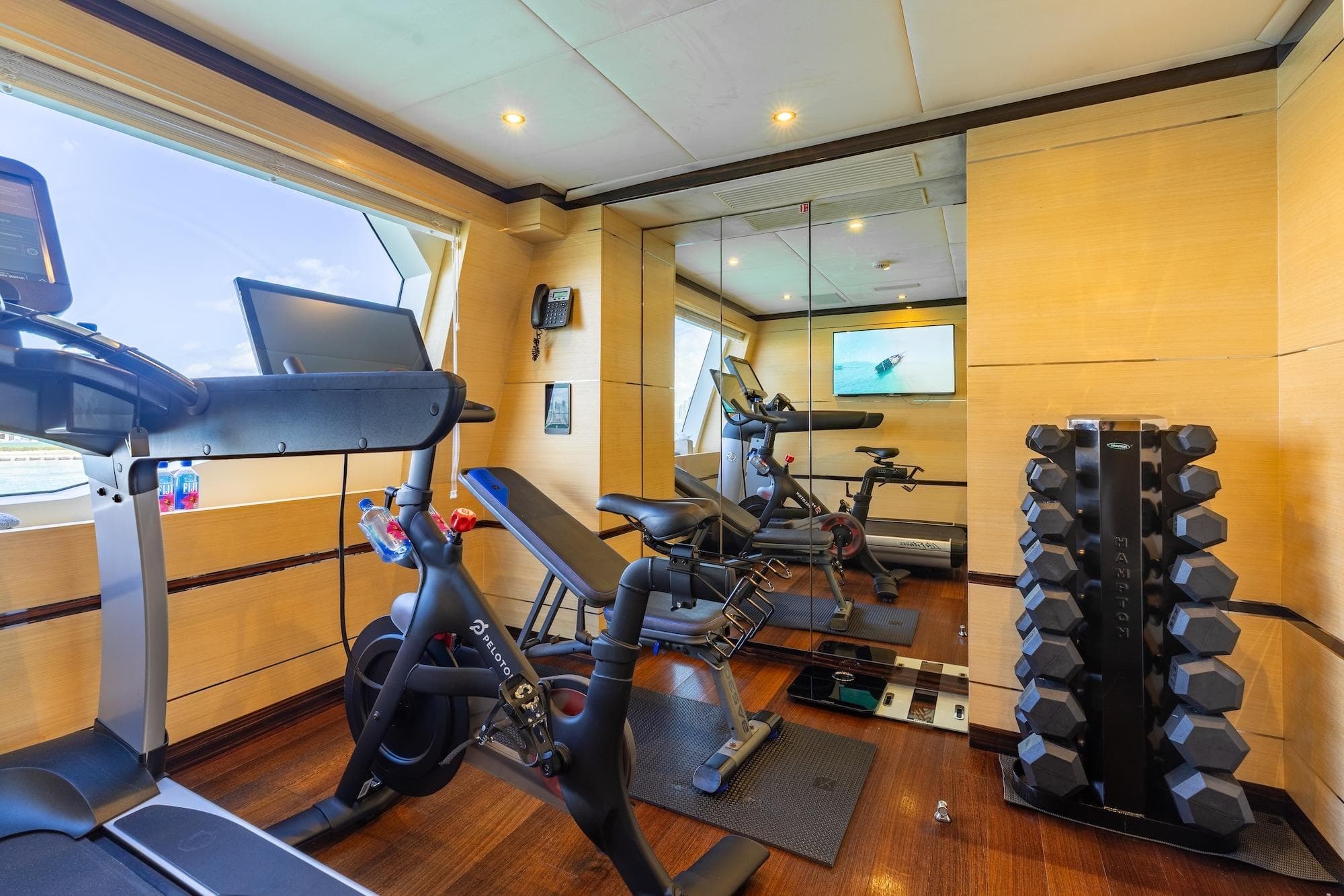 Luxury yacht gym with modern equipment on 2018 Benetti Fast 125.
