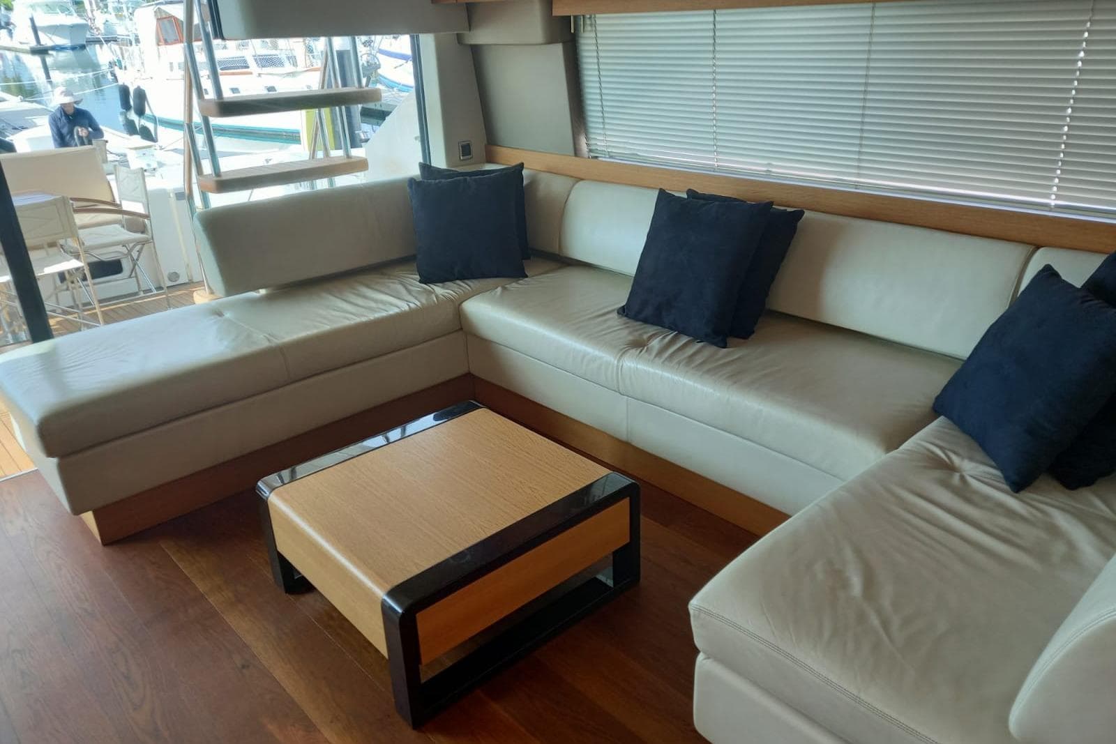Luxurious interior of 2012 Fairline Squadron 65 yacht with elegant seating and modern decor.