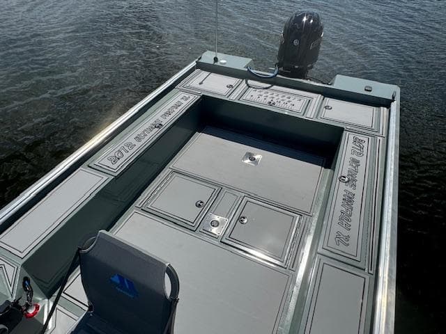 2025 Custom Ultimate Panfish XL boat with spacious deck and storage compartments.
