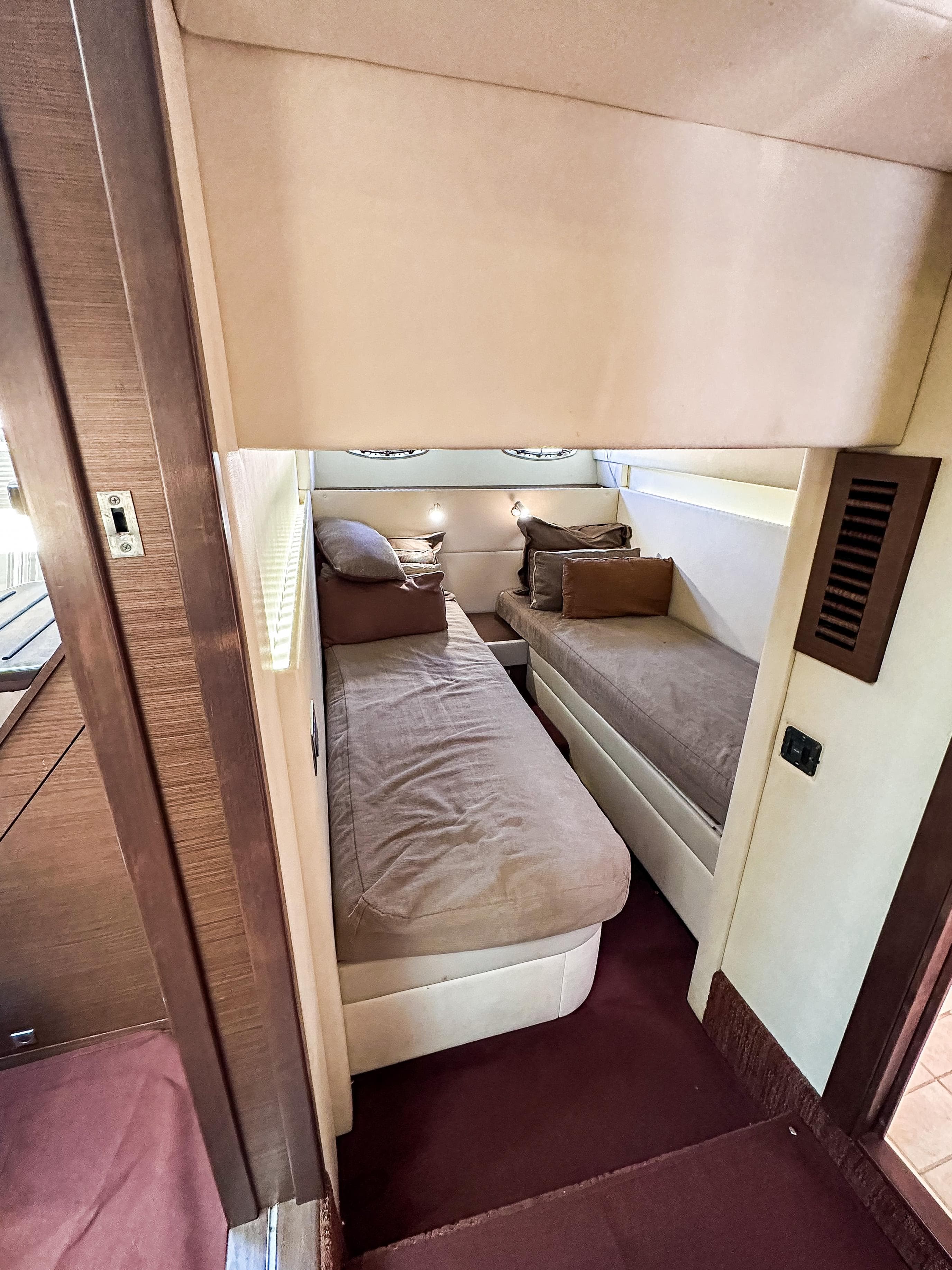 2013 Sea Ray 470 Sundancer cabin with twin beds and modern interior design.