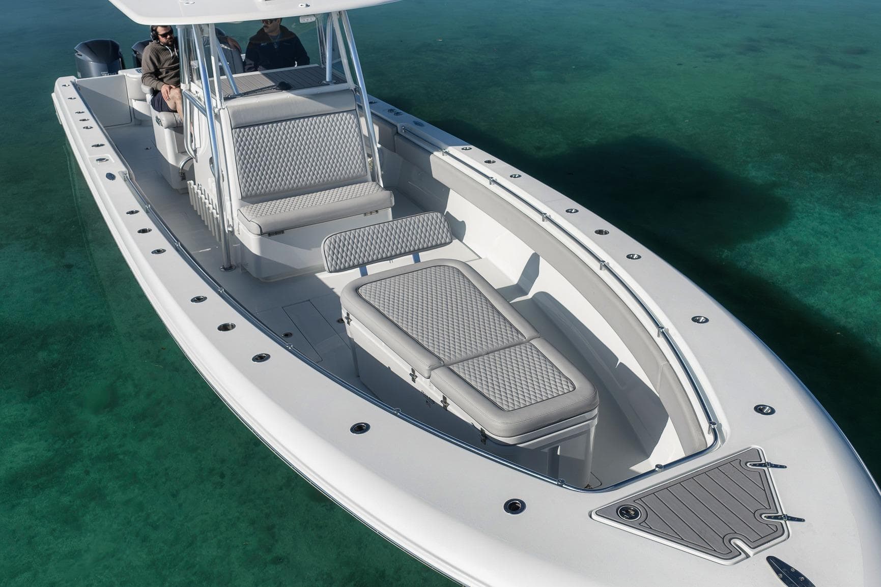 2021 Contender 39 ST boat on clear water, showcasing sleek design and spacious seating.