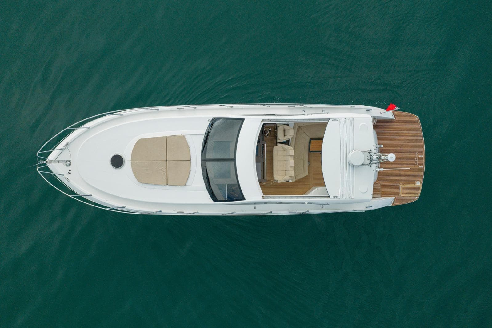 Aerial view of 2019 Windy 46 Chinook yacht on calm water.