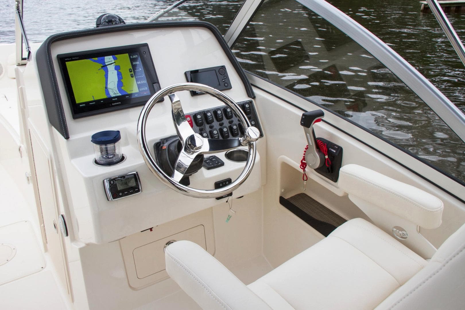 Manufacturer Provided Image: 2019 Grady-White Freedom 235 boat helm with navigation system and controls.