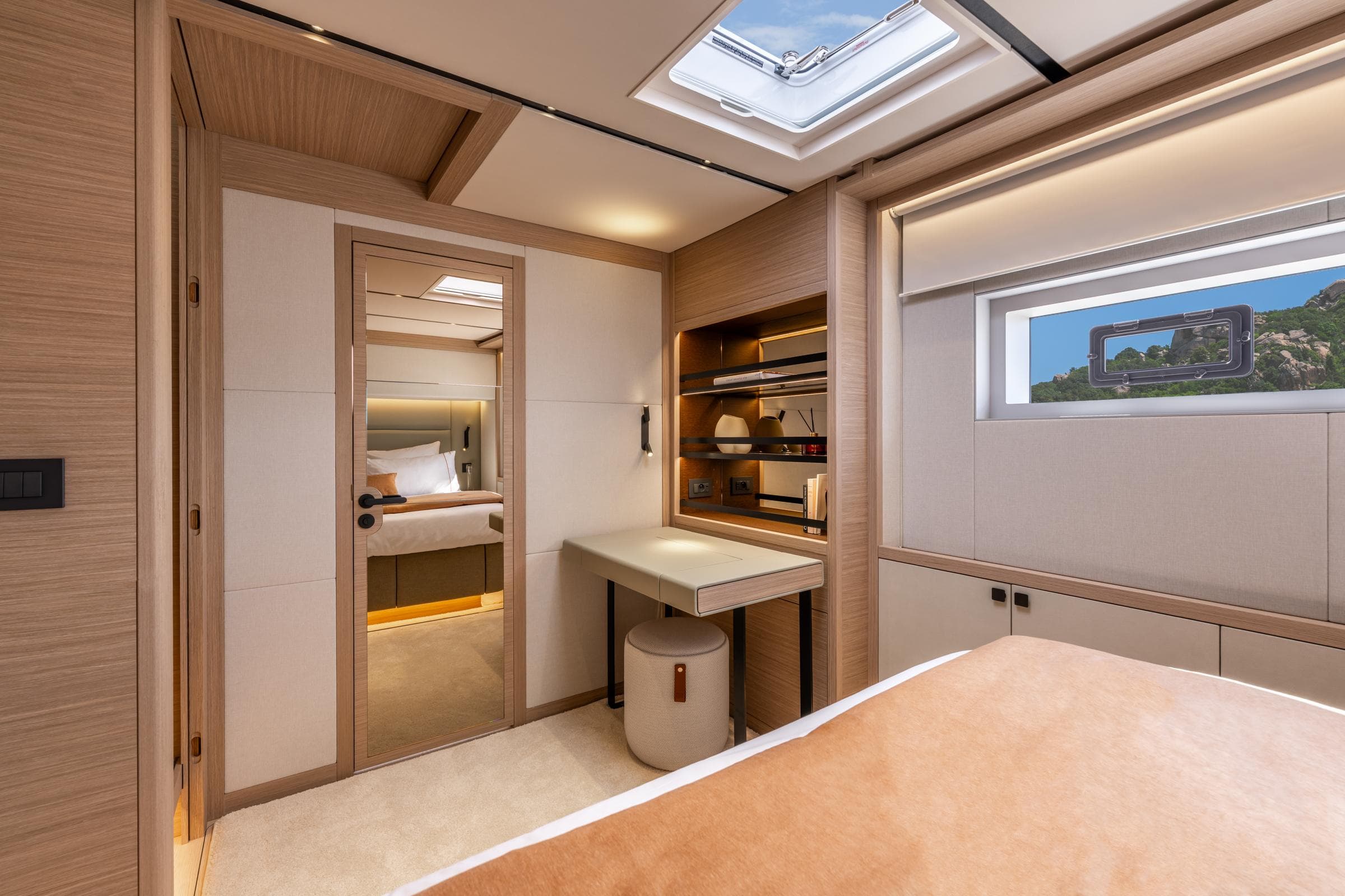 Luxurious interior of 2025 Lagoon Eighty 2 yacht with modern design and natural lighting.