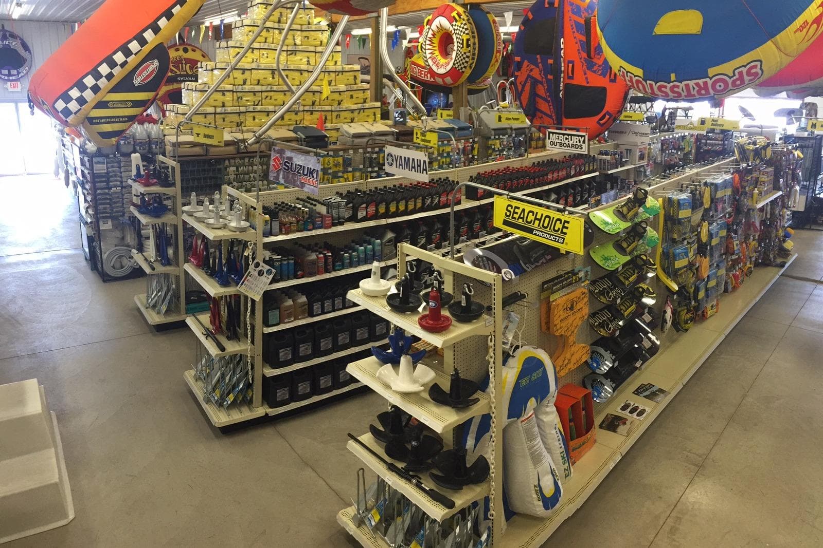 Boat supply store with various marine accessories and equipment on display.