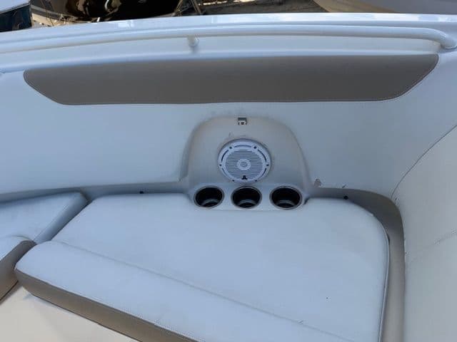 Interior of 2016 Sailfish 275 DC with speaker and cup holders.