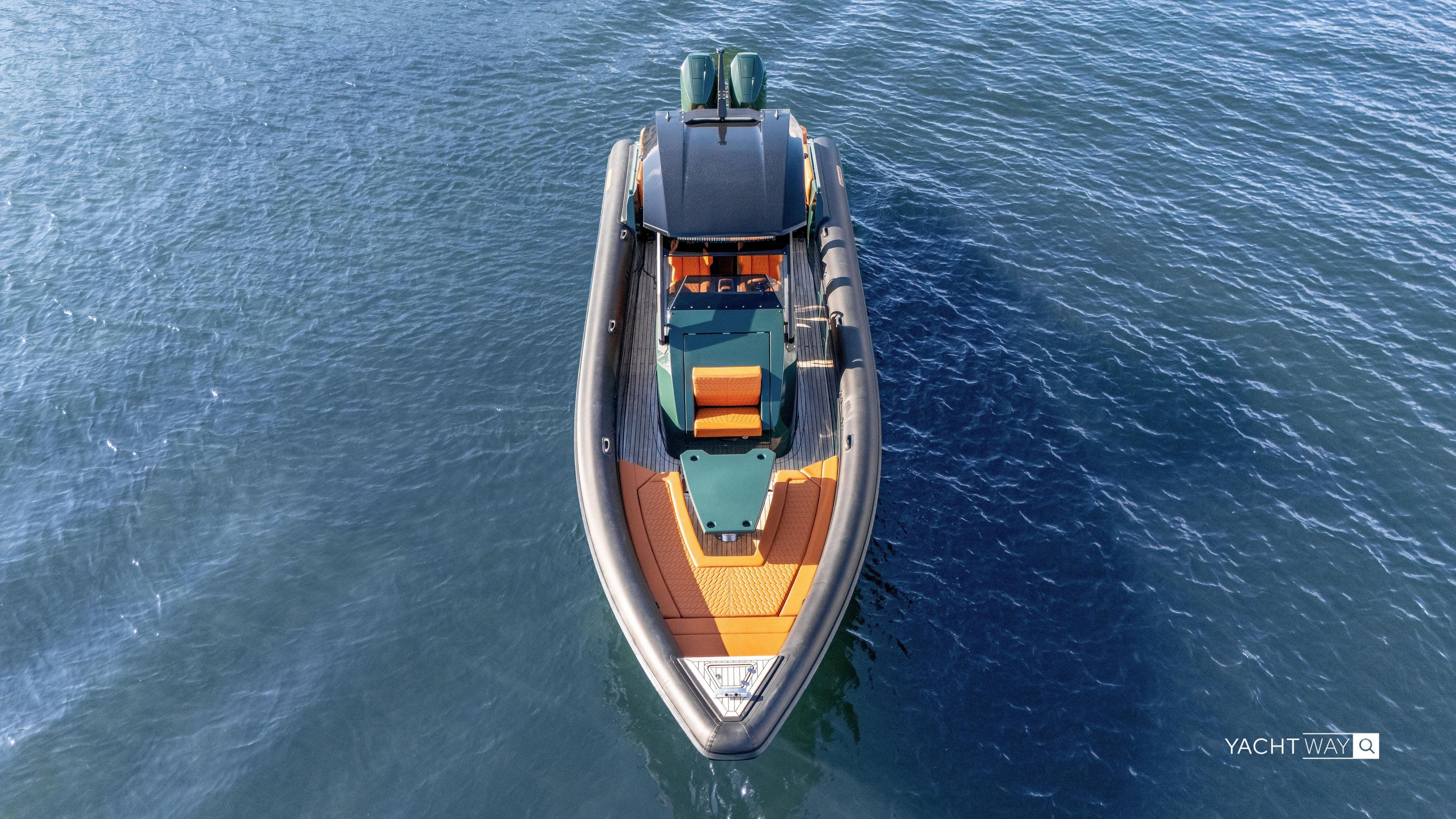 2025 Skipper-BSK 38NC boat on water, aerial view, sleek design.