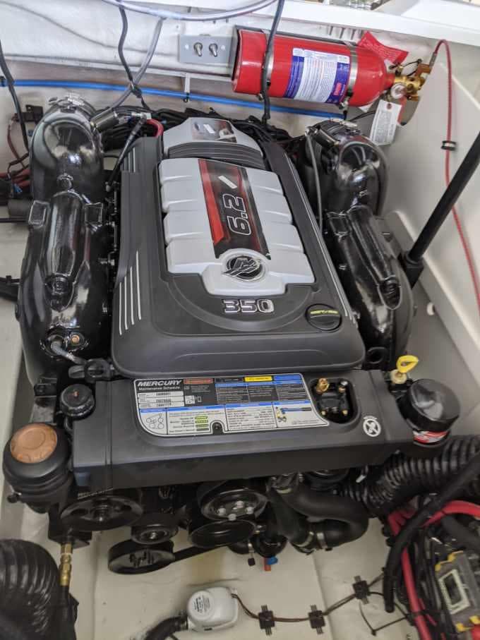 2021 Sea Ray SLX 230 engine compartment with MerCruiser 6.2L 350 HP engine.