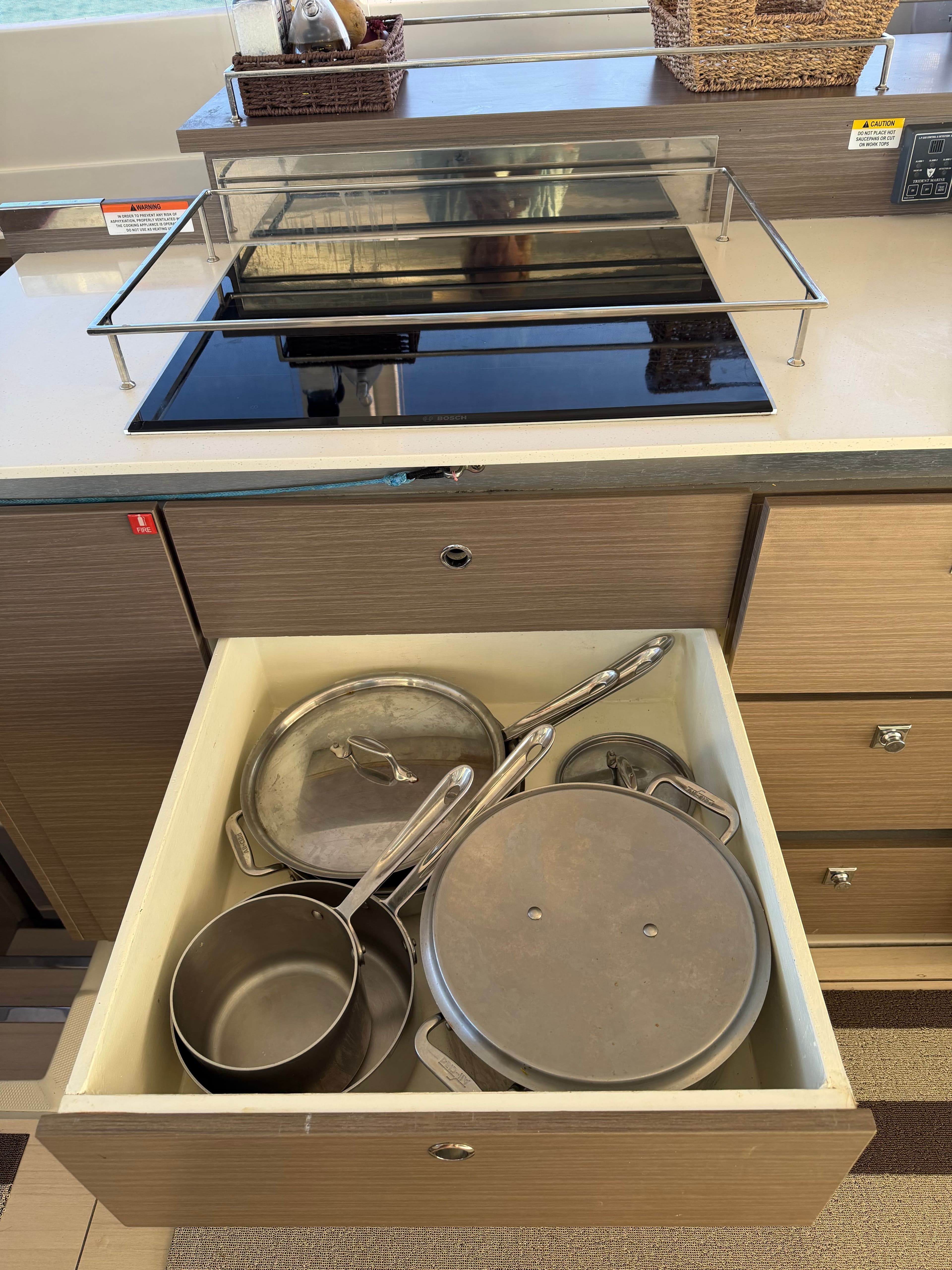 Kitchen drawer with pots in Leopard 50 yacht, 2023 model.