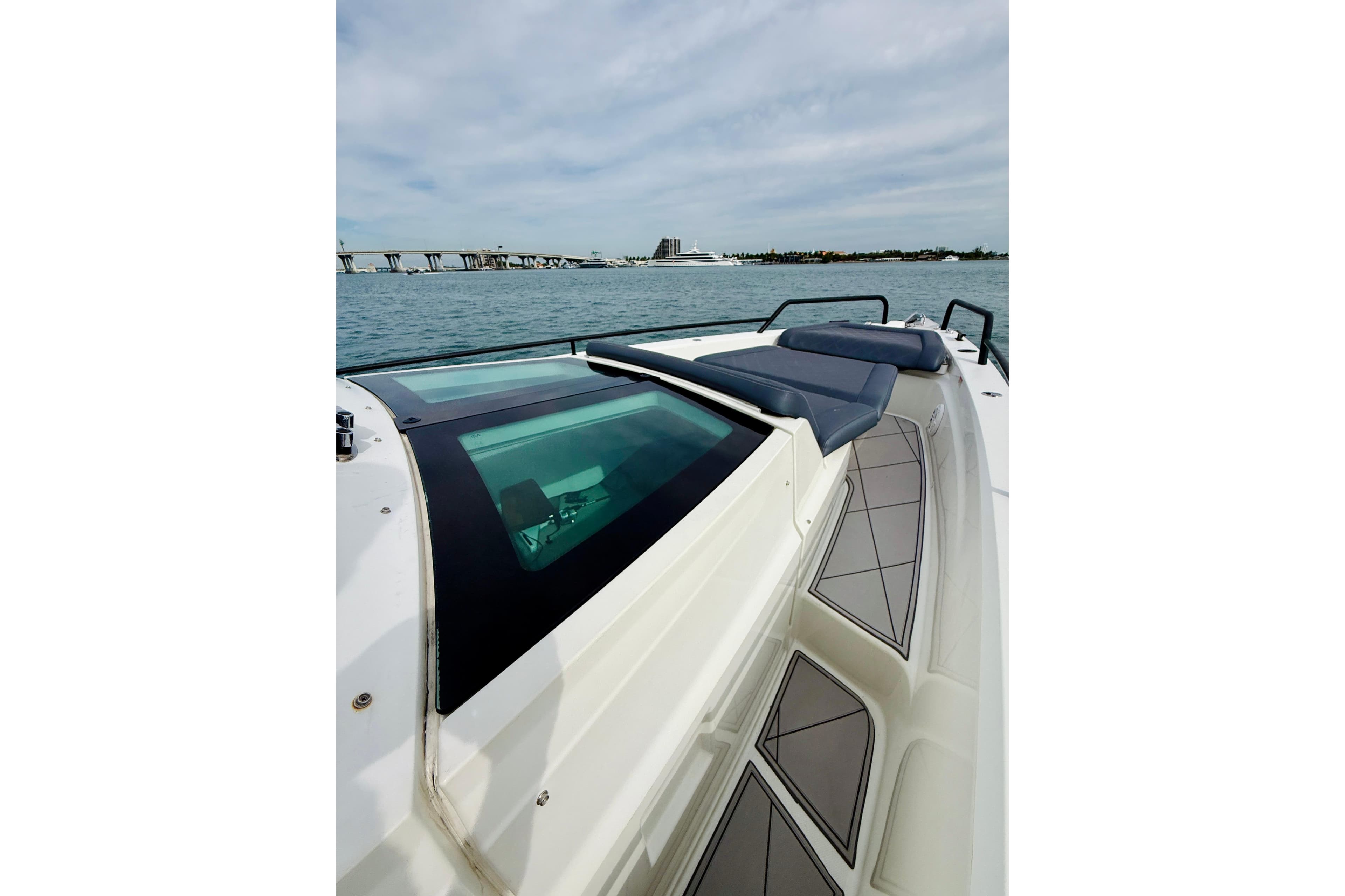 2021 Axopar 37 Sun Top boat with sleek design on open water.