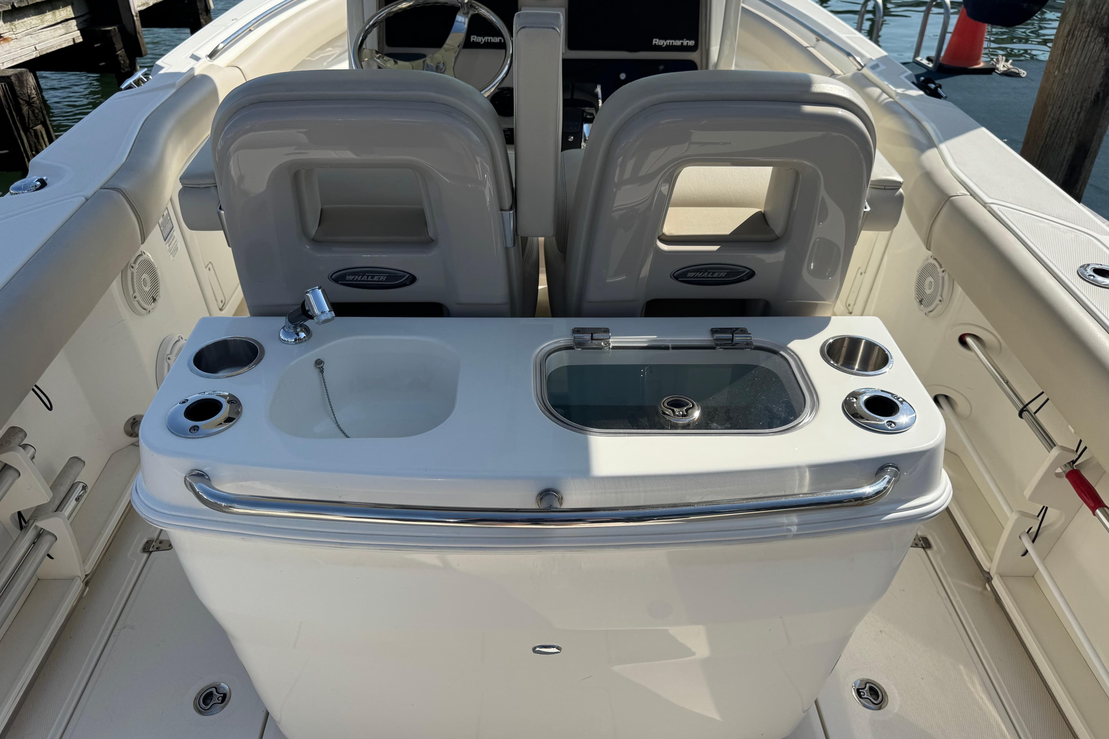 2020 Boston Whaler 280 Outrage boat interior with seating and console features.