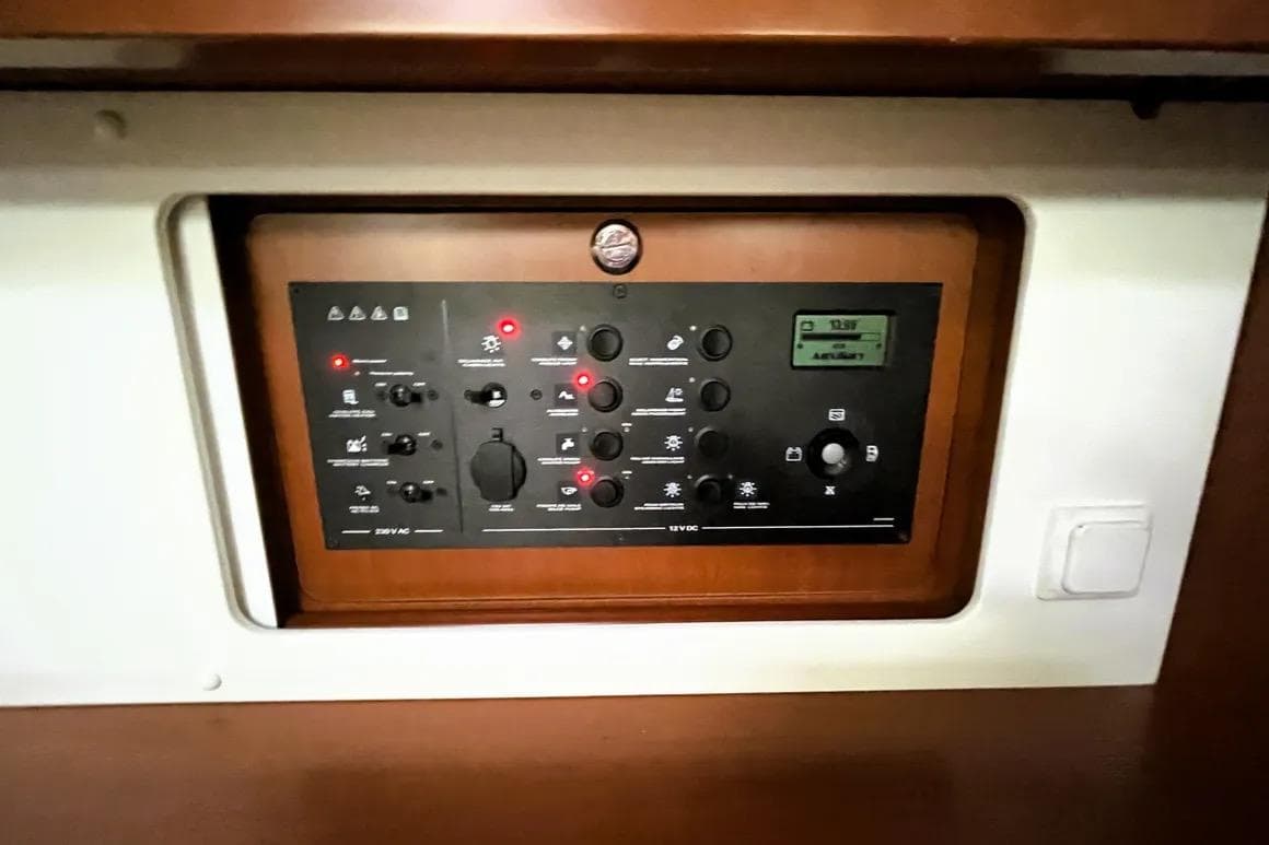 Control panel of a 2018 Beneteau Oceanis 45 yacht, featuring various switches and indicators.