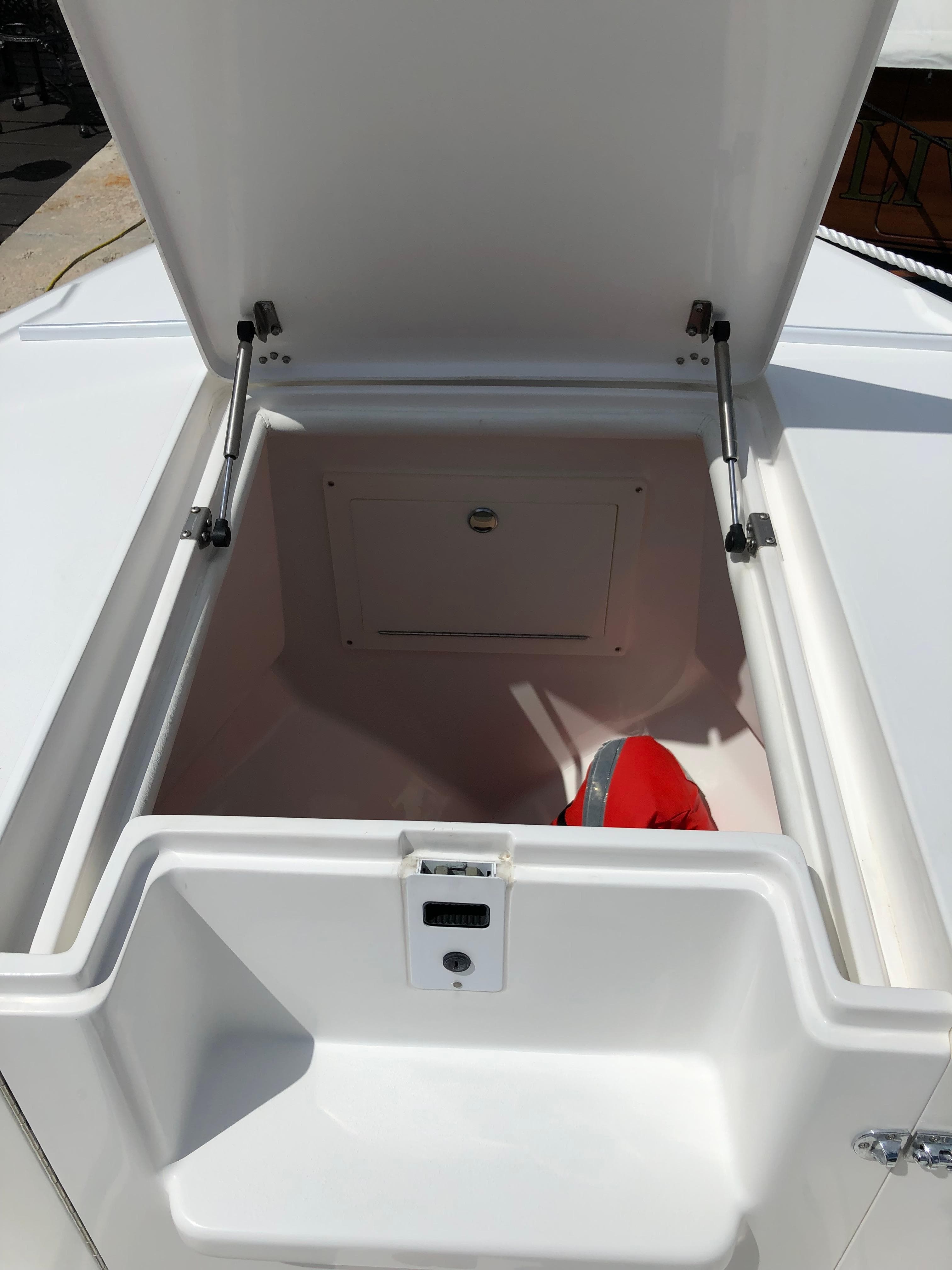 Open storage compartment on a 2008 Intrepid 370 boat.