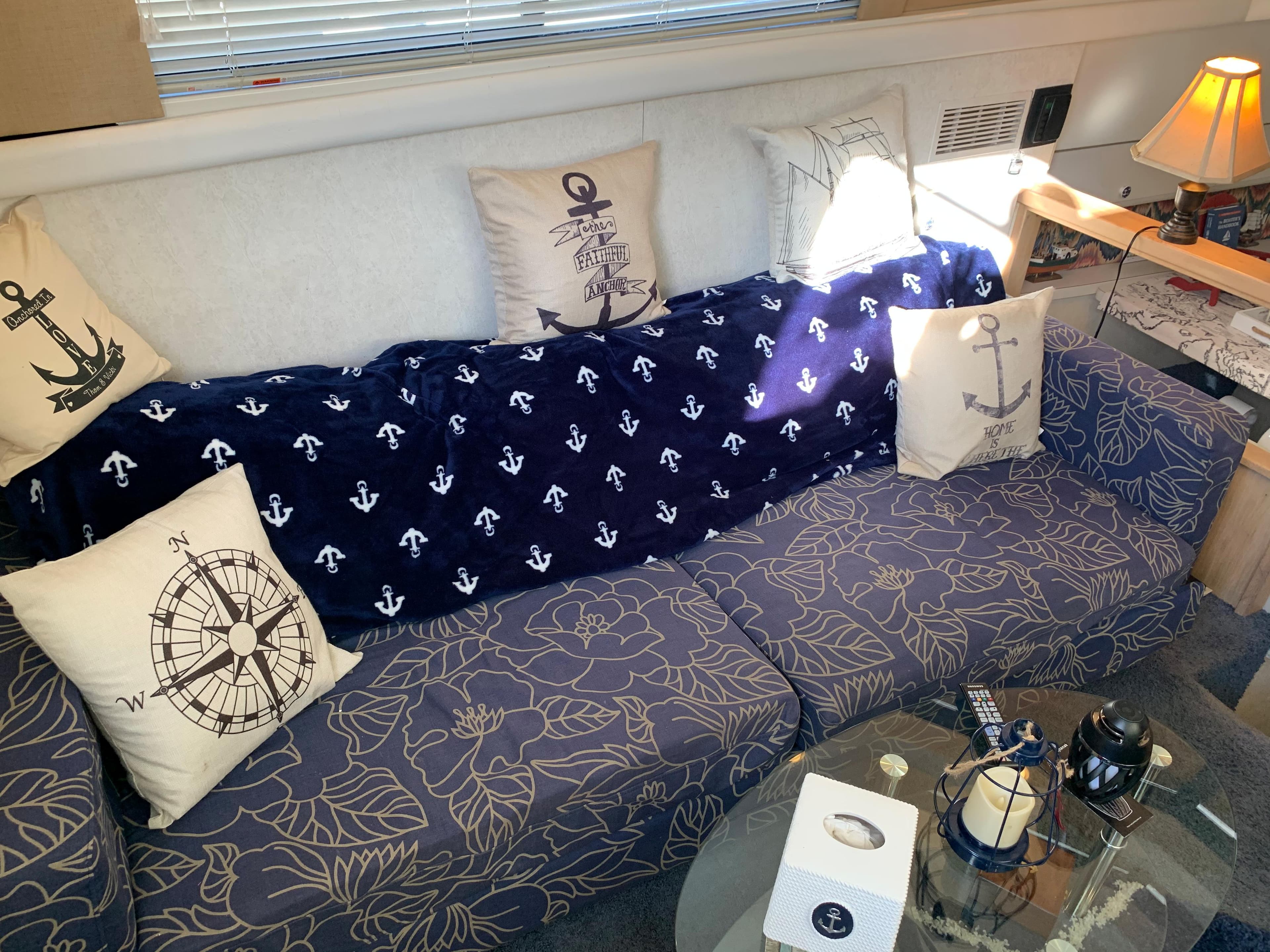 Interior of 1992 Silverton 34 Aft Cabin Motor Yacht with nautical-themed decor.