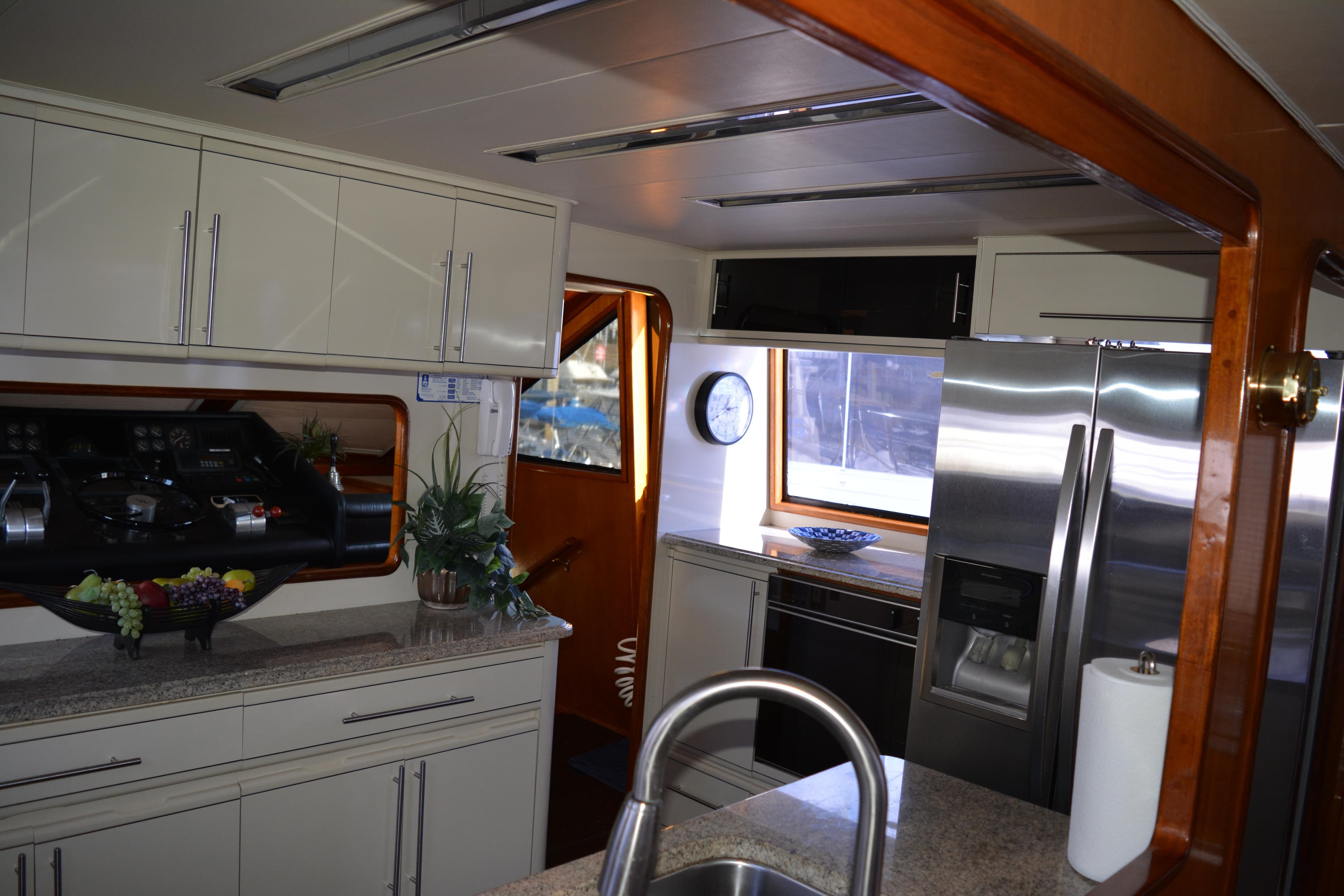 Interior of 1989 Viking Motor Yacht kitchen with modern appliances and sleek cabinetry.