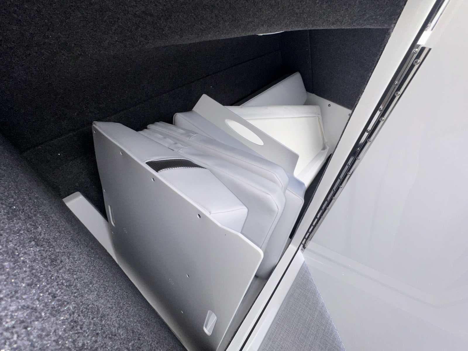 2025 Formula 350 Crossover Bowrider I/O interior storage compartment with white dividers.