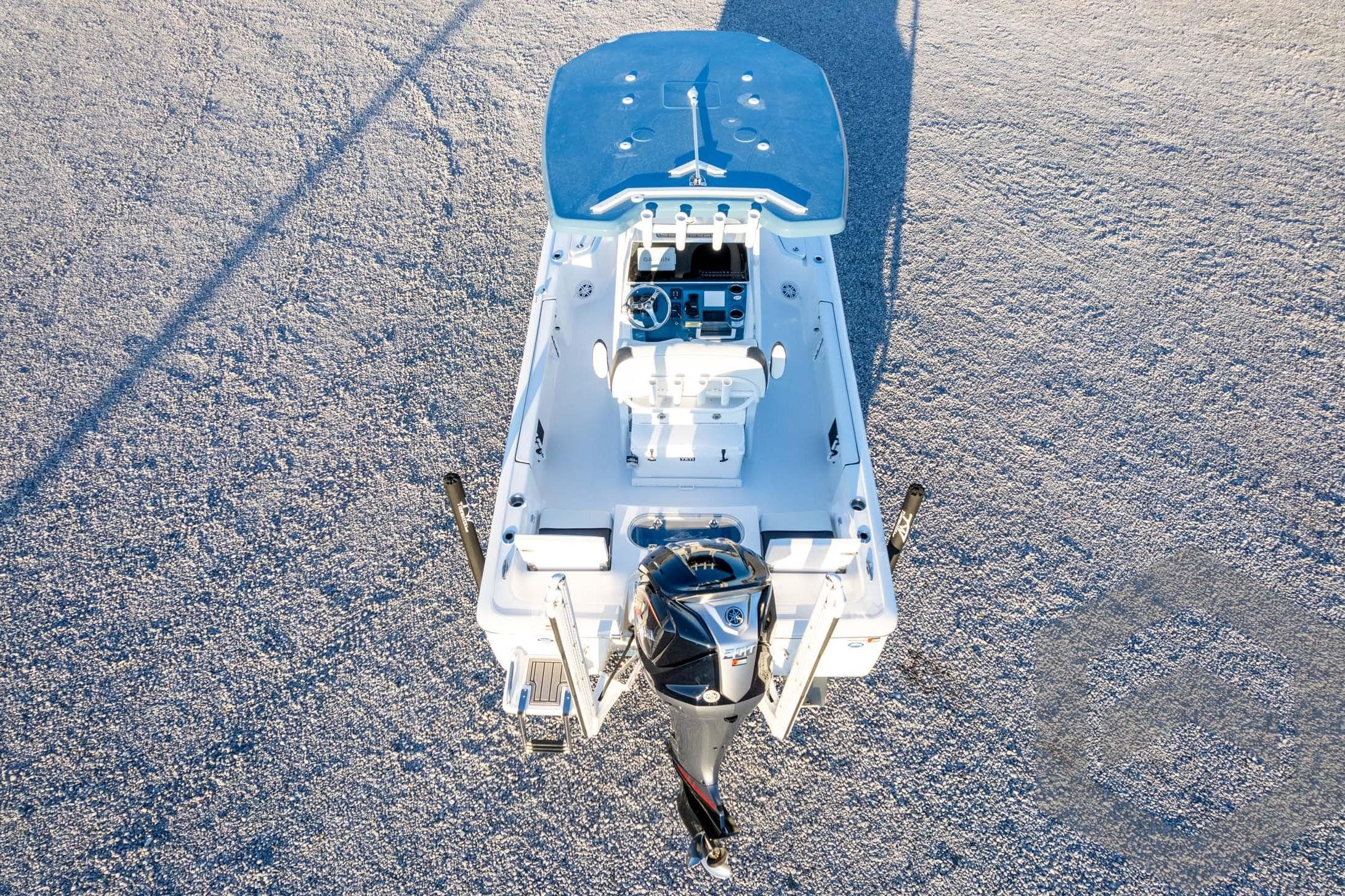 2026 Tidewater 2110 Bay Max boat, aerial view, showcasing deck and motor.