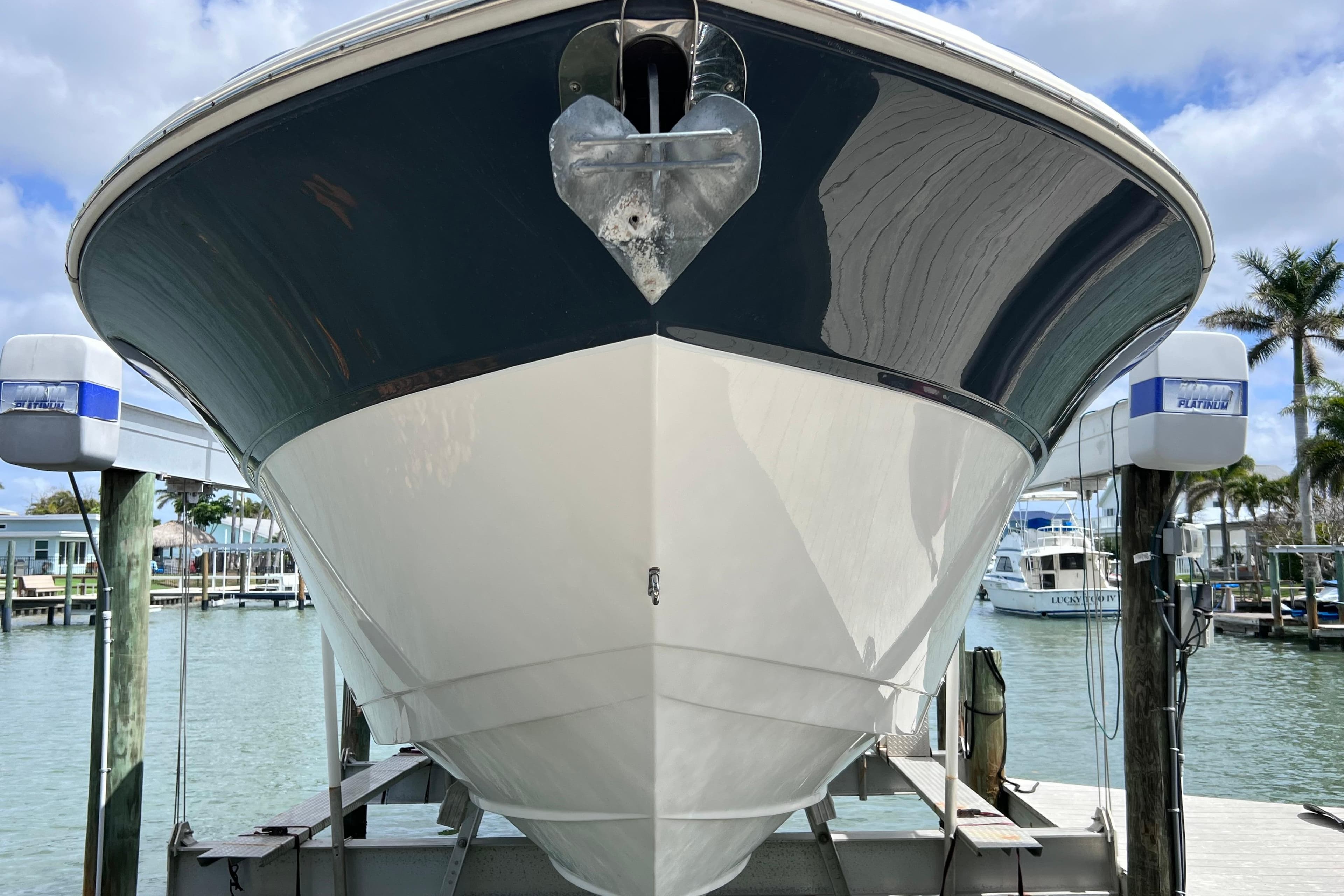2019 Sea Fox 328 Commander boat docked, showcasing sleek hull design.