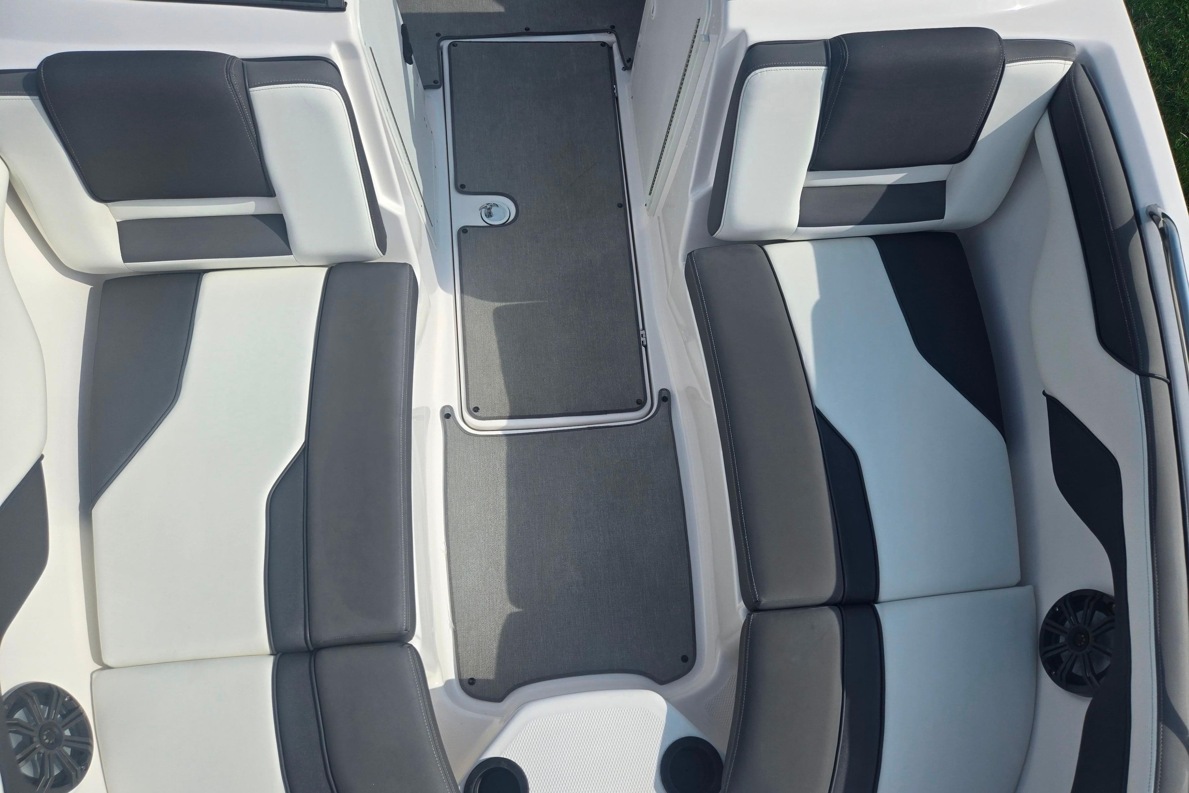 2022 Yamaha Boats AR210 interior seating with gray and white upholstery.