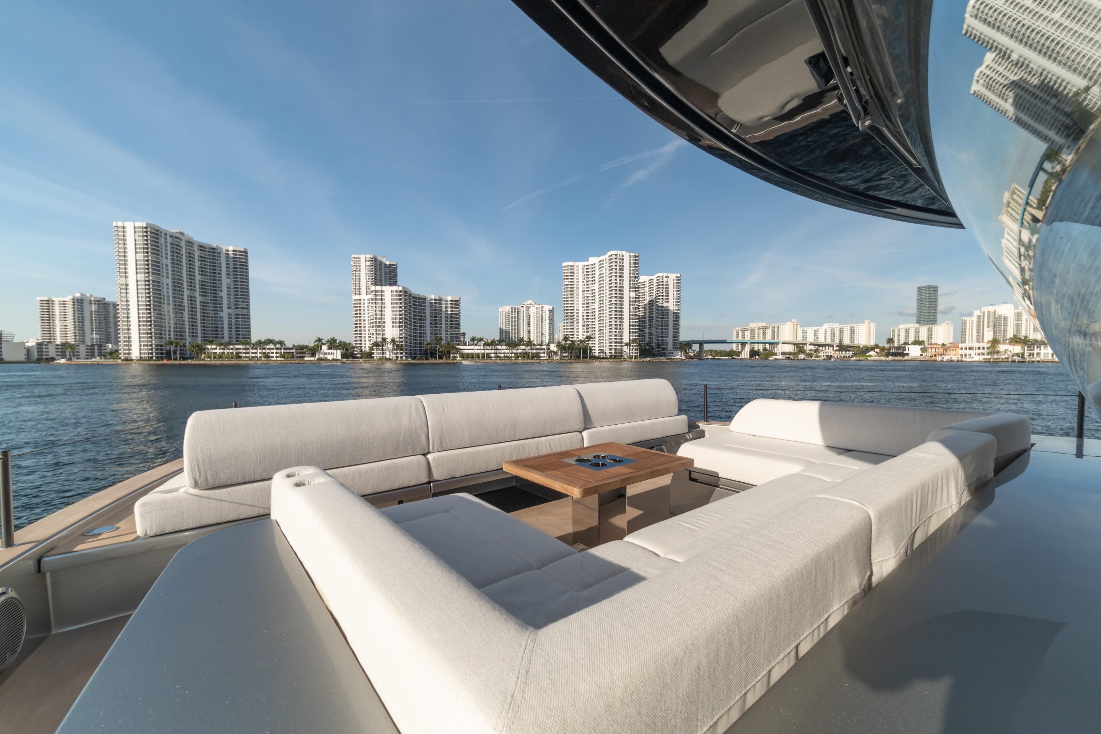 Luxurious 2027 Pardo Yachts GT75 with spacious deck, city skyline view.