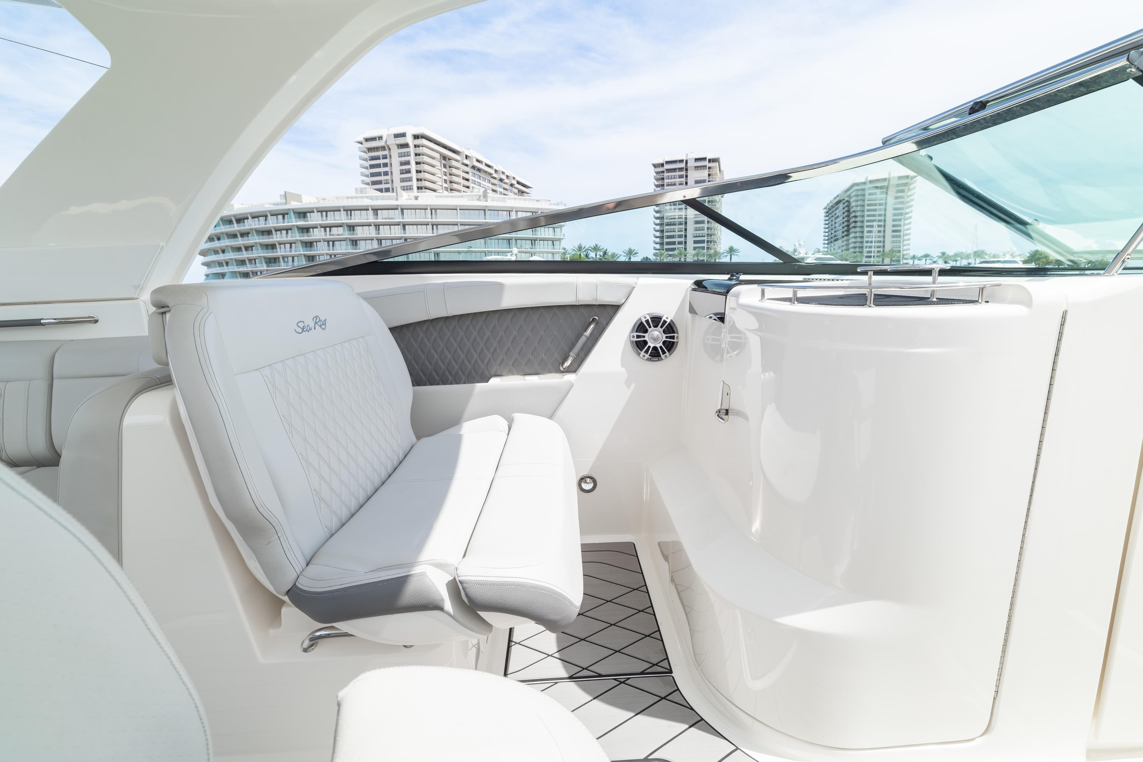 2023 Sea Ray SLX 350 Outboard interior with luxurious seating and modern design.