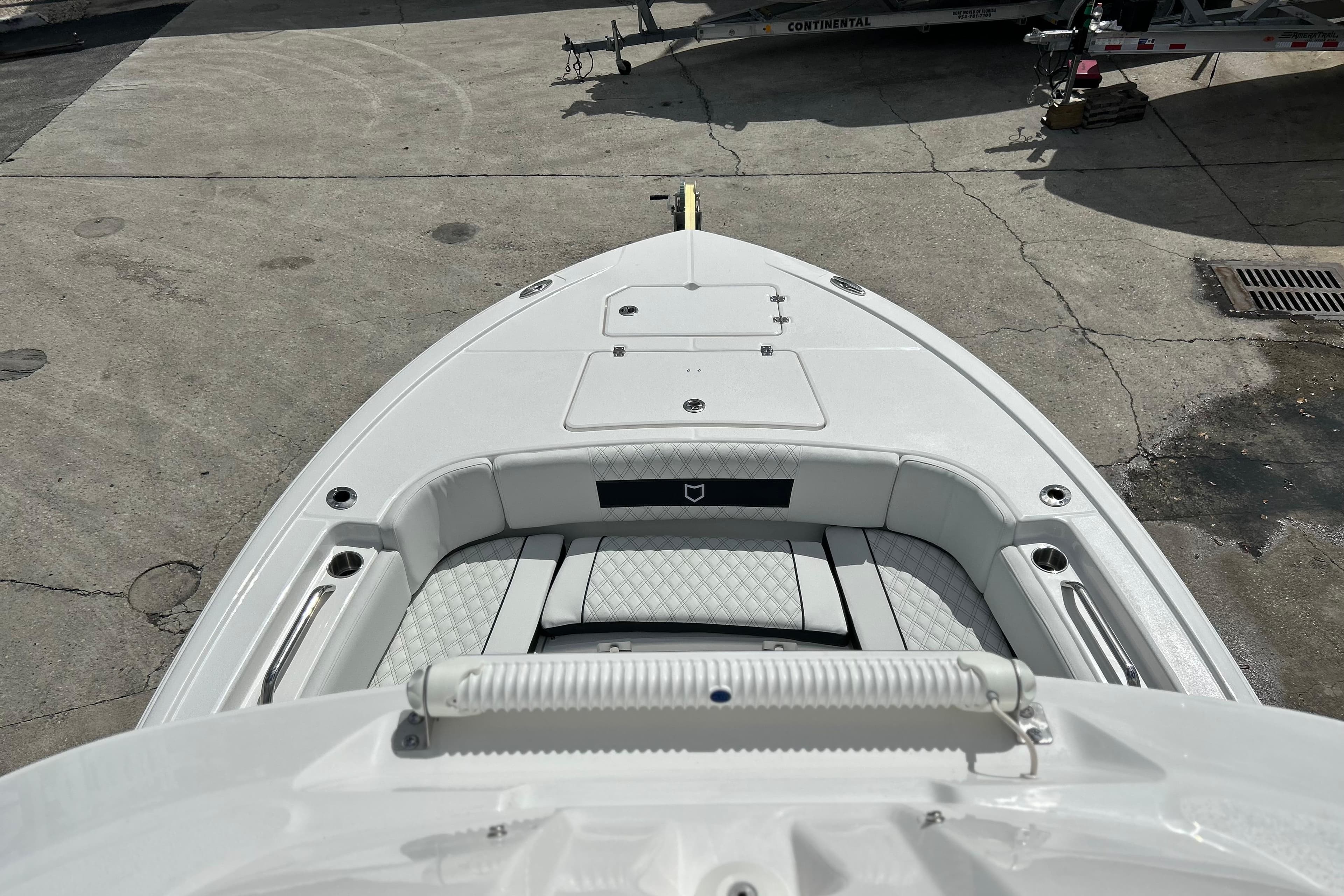 2026 Sea Fox 282 Hybrid LT boat bow with seating and storage compartments.