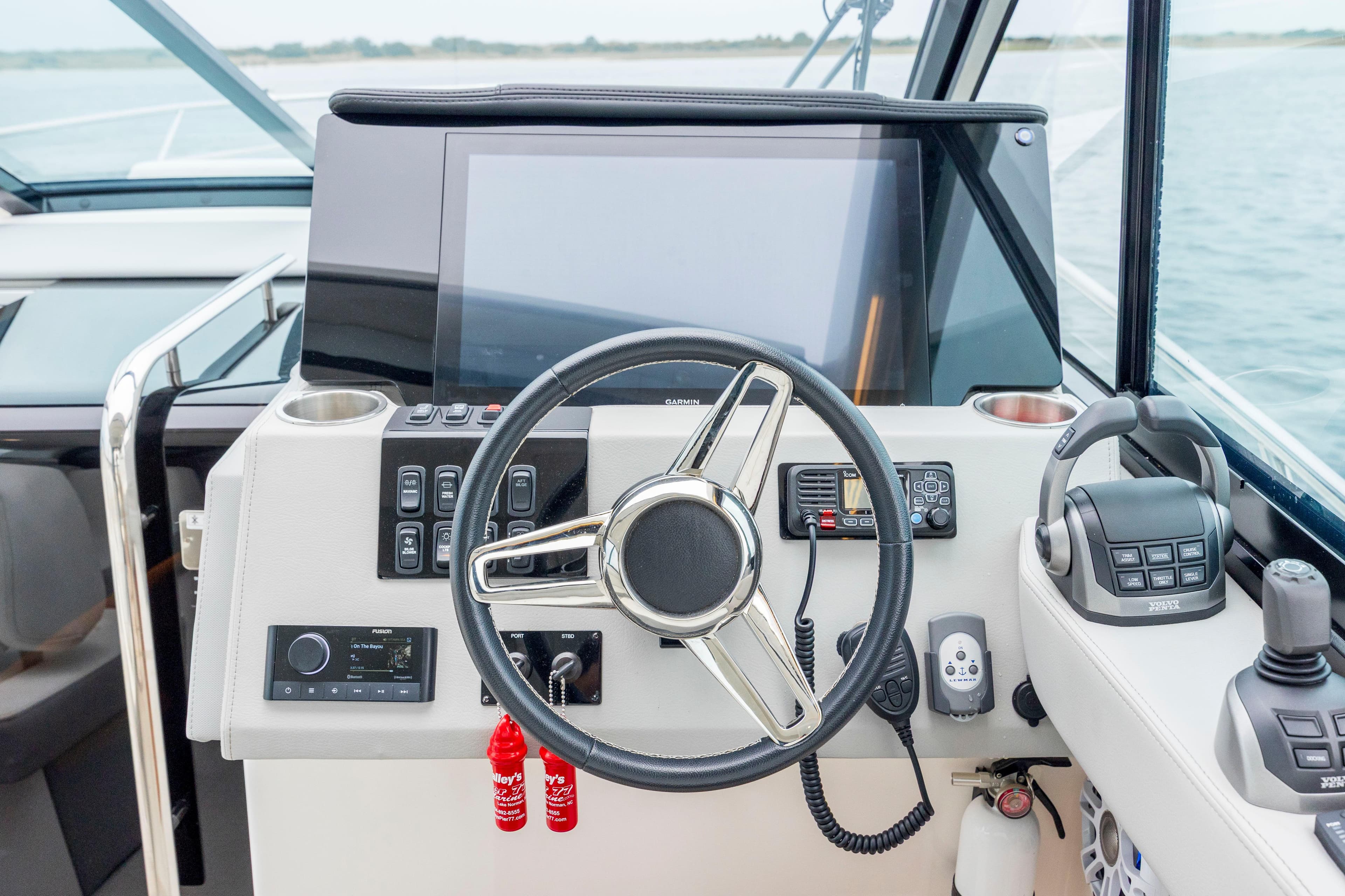2022 Regal 36 Grande Coupe helm with steering wheel, controls, and navigation display.