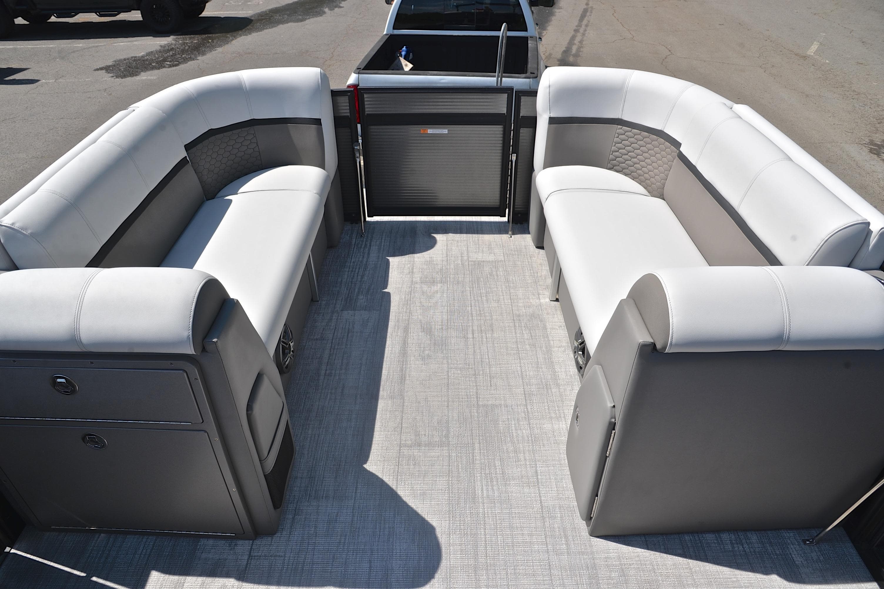 2022 Qwest E822 pontoon boat interior with gray seating and flooring.