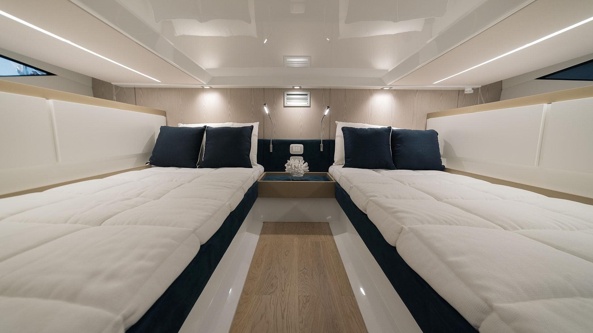 Interior cabin of 2025 Fiart 35 Seawalker with twin beds and modern design.