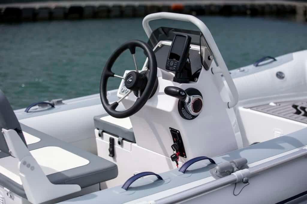 Steering console of Highfield Classic 380 boat, year 2025.
